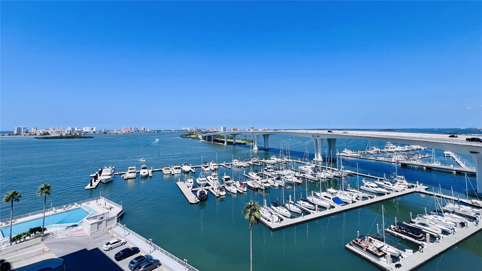VIEW OF THE MARINA AND POOL FROM THE BALCONY