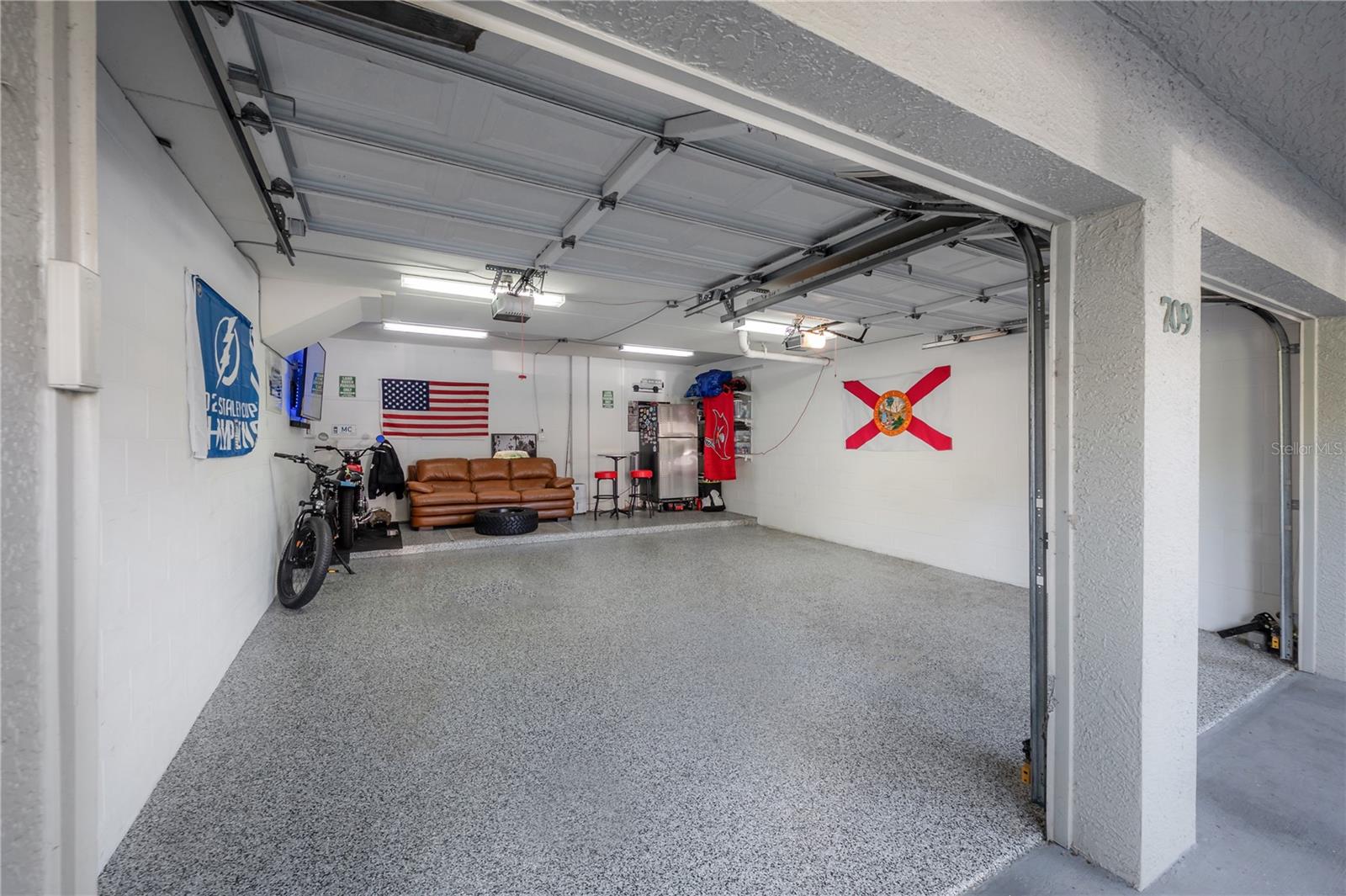 Oversized 2 car garage with epoxy floors (easily fits 2 SUVs)