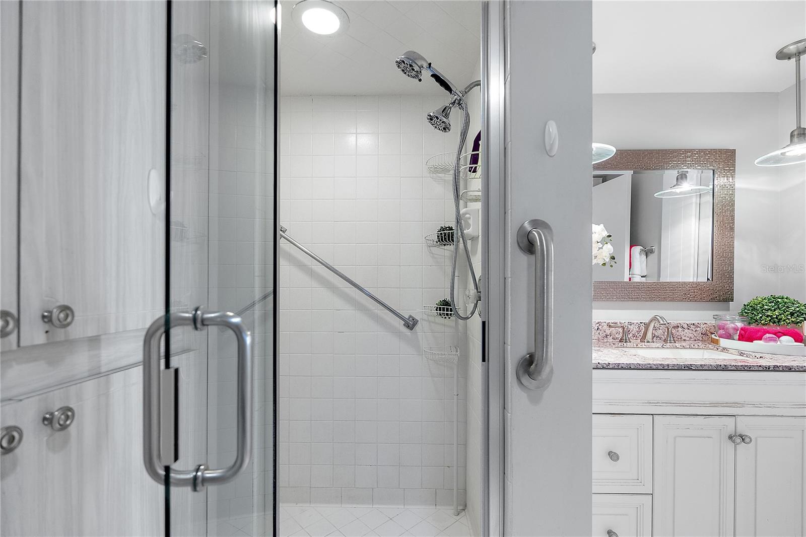 Multiple shower heads and safety rails