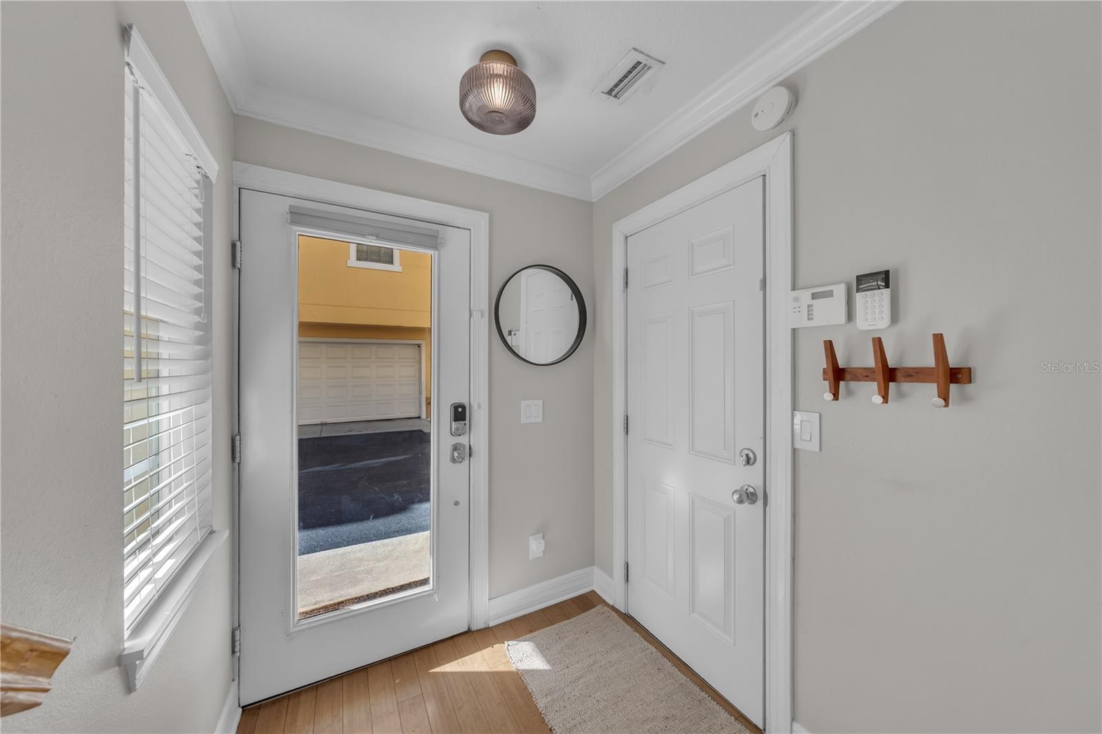 first floor entrance, garage access door.