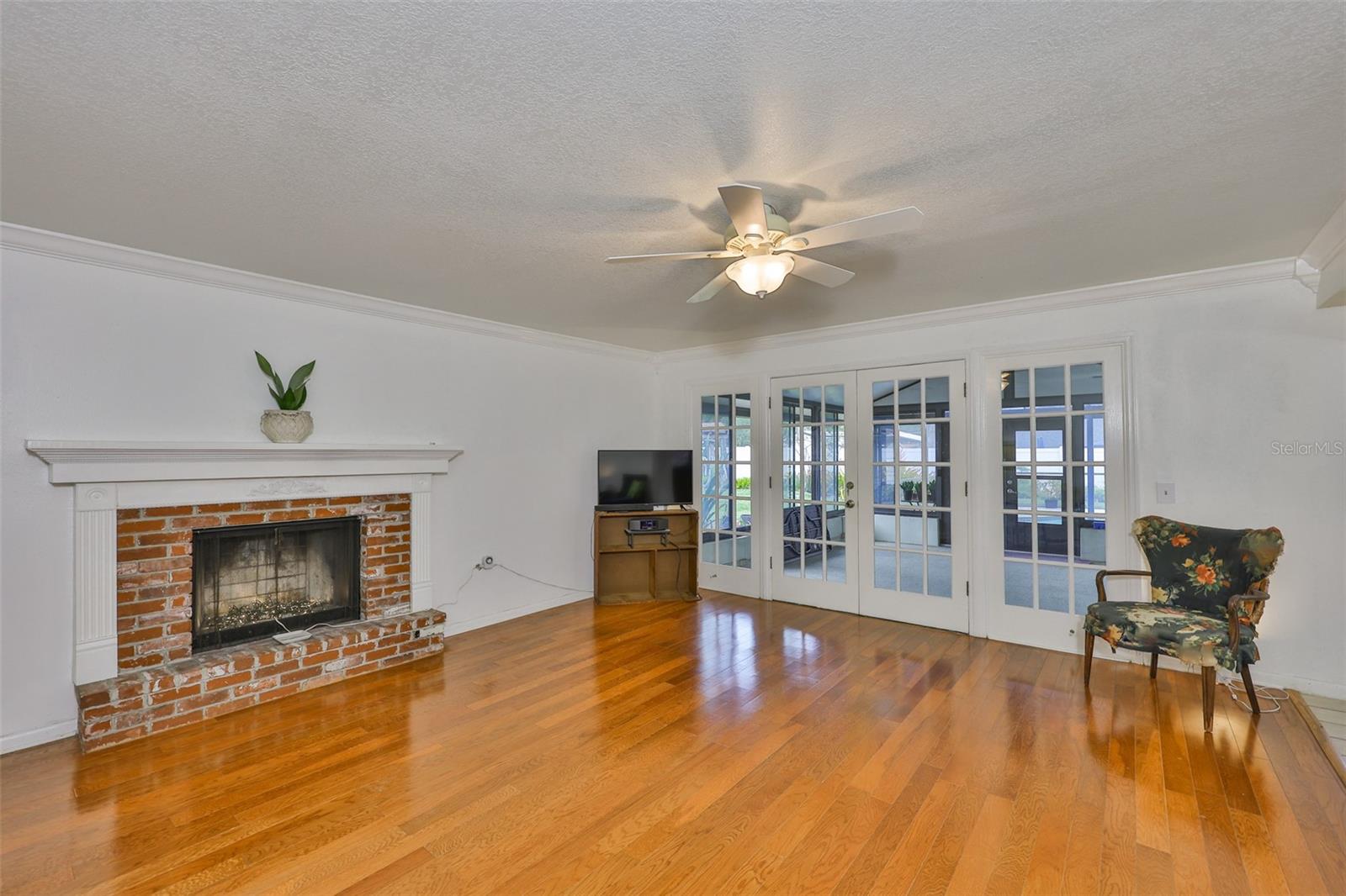 Family room with wood burning fireplace