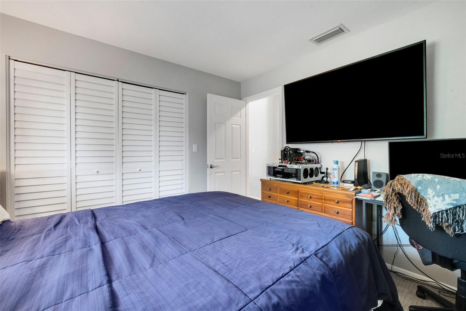 guest bedroom across the hall from guest bath