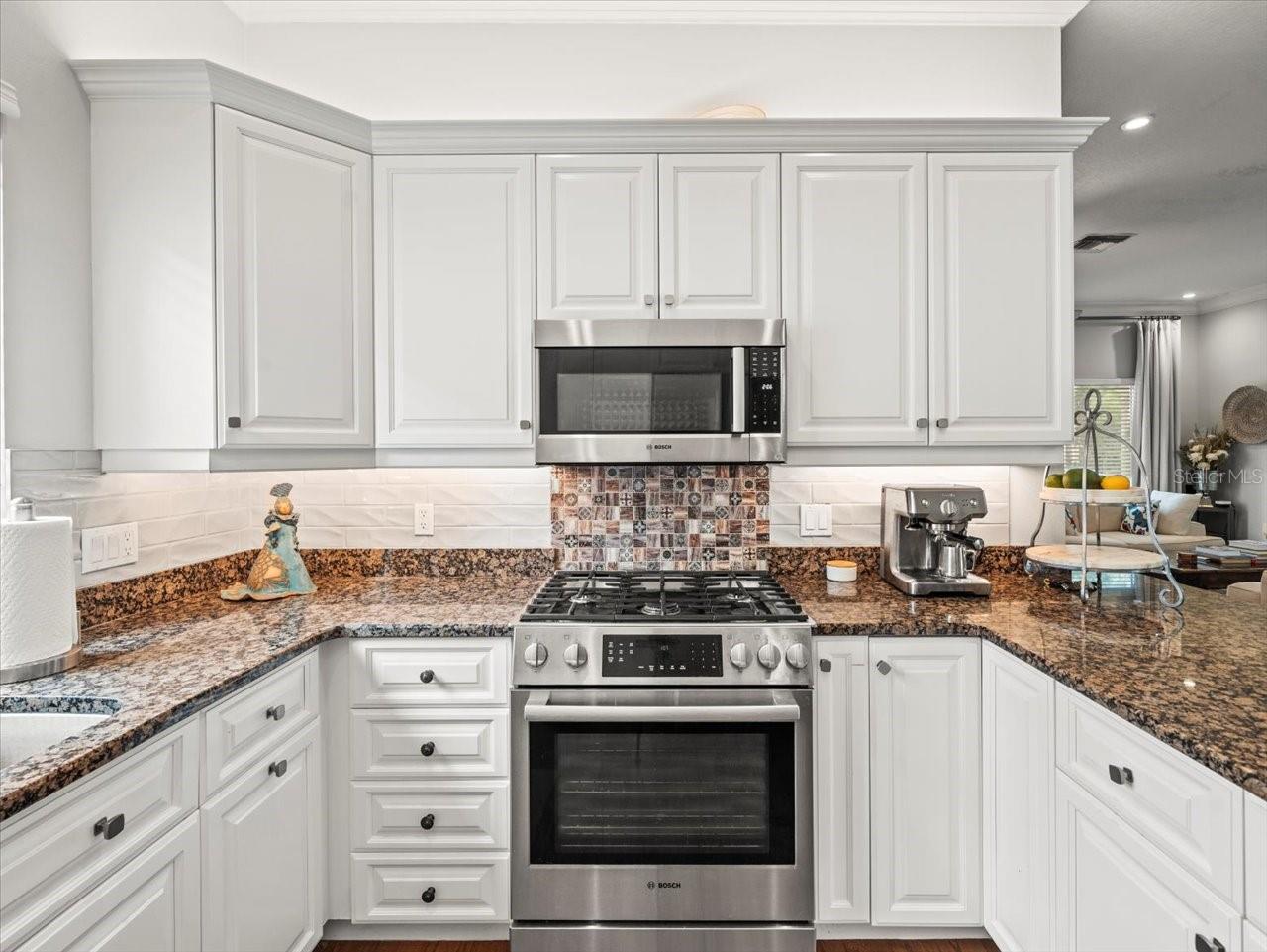 Real wood soft close doors and Bosch appliances with gas hook-up