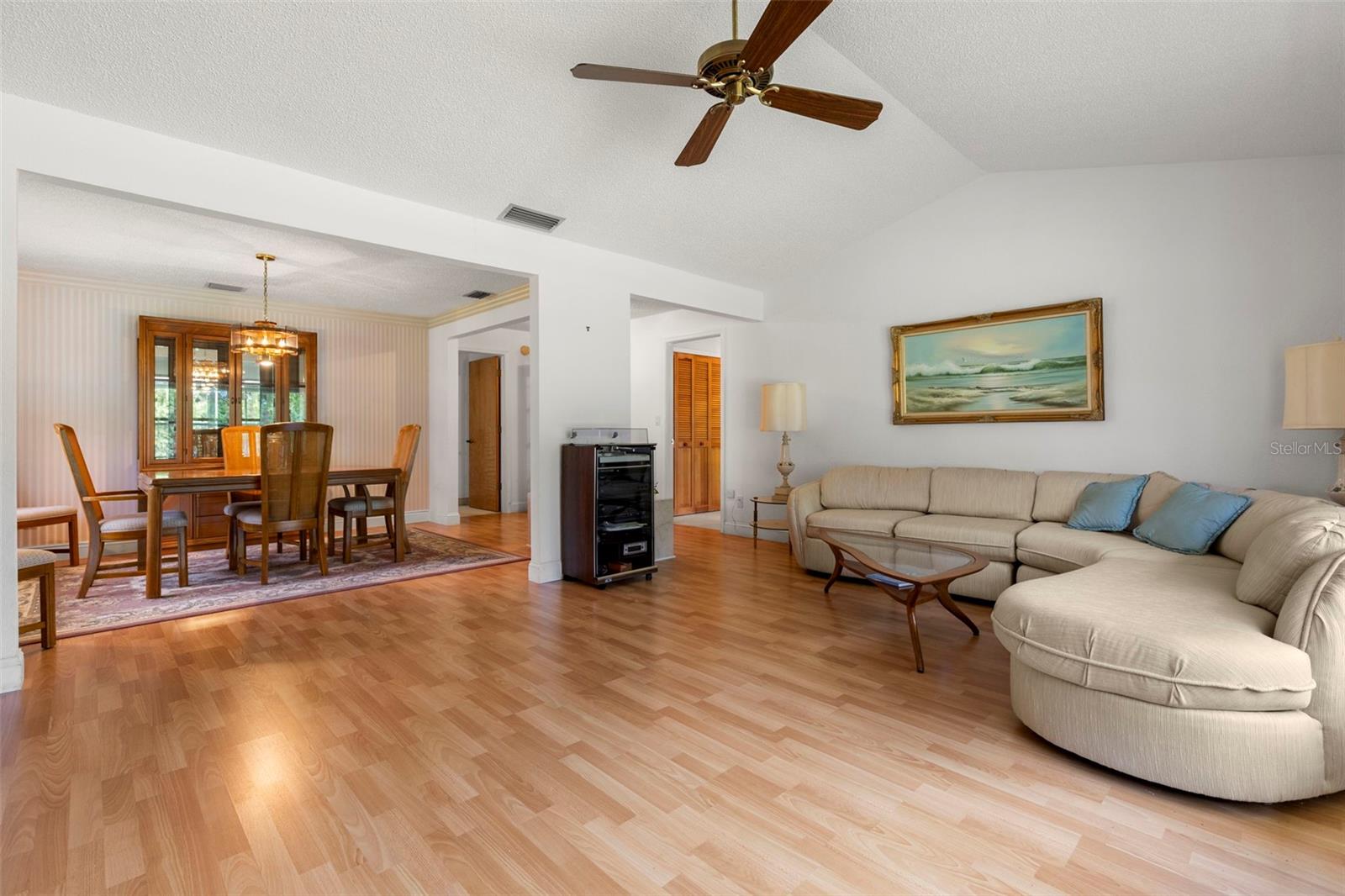Living Room Opens to Dining Room