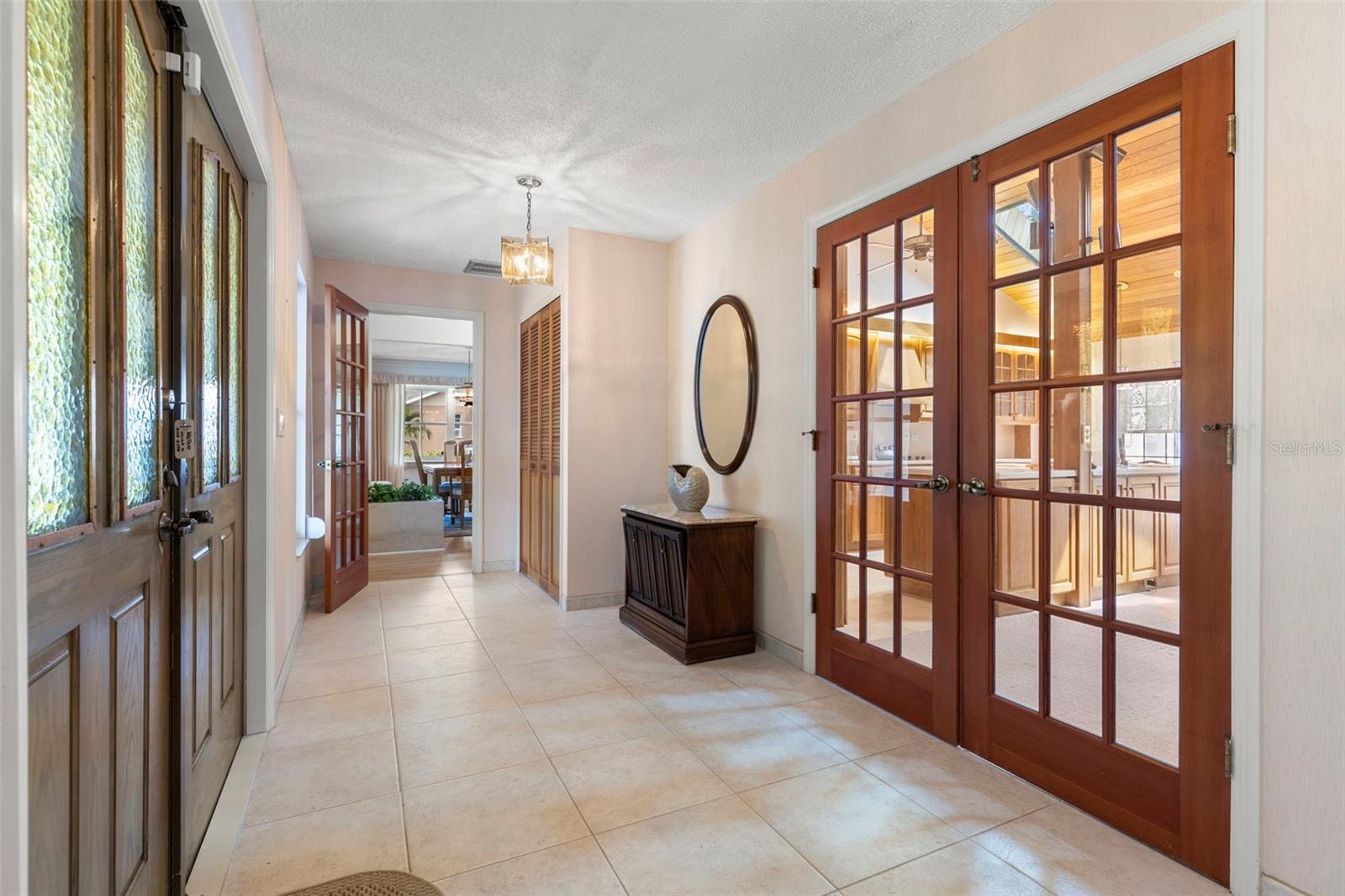 Foyer with French Doors to Living Area
