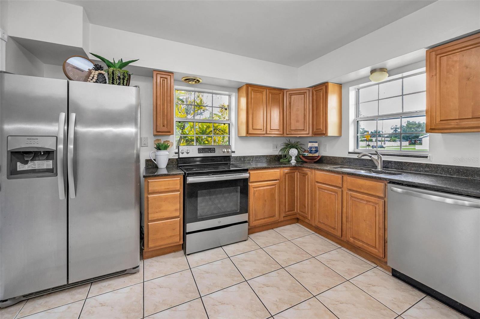 Kitchen has had a past update to cabinets, counters, and kitchen appliances.