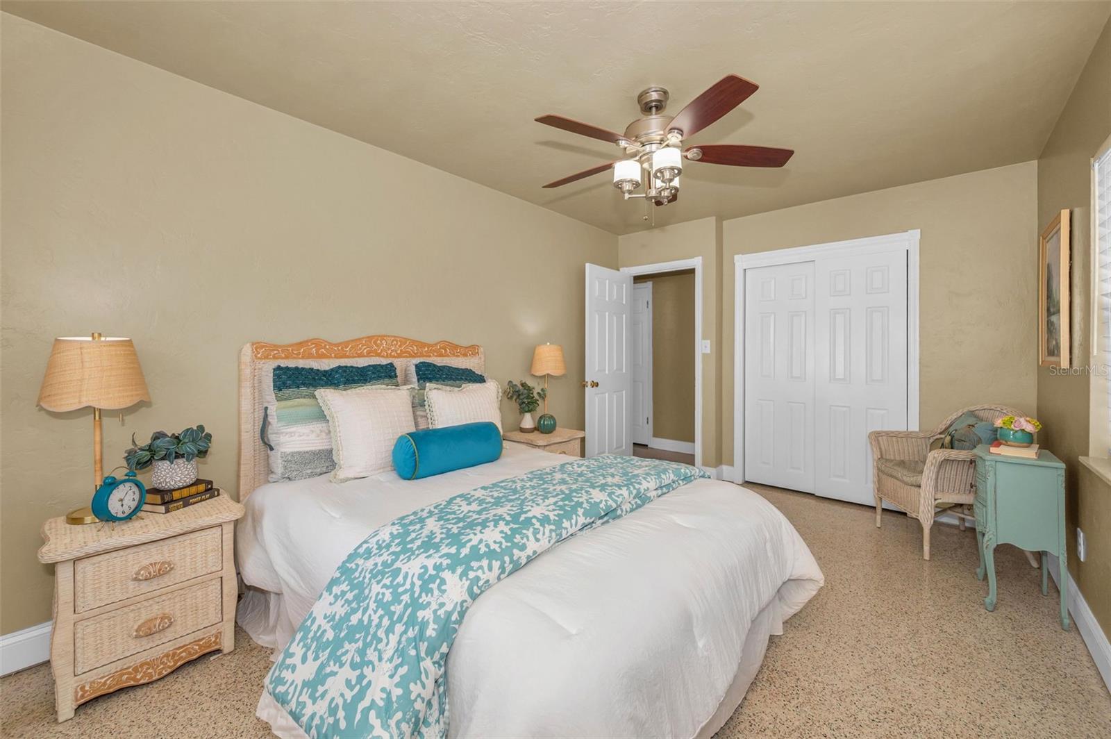 Guest bedroom #1 has plenty of space, storage, and natural light.
