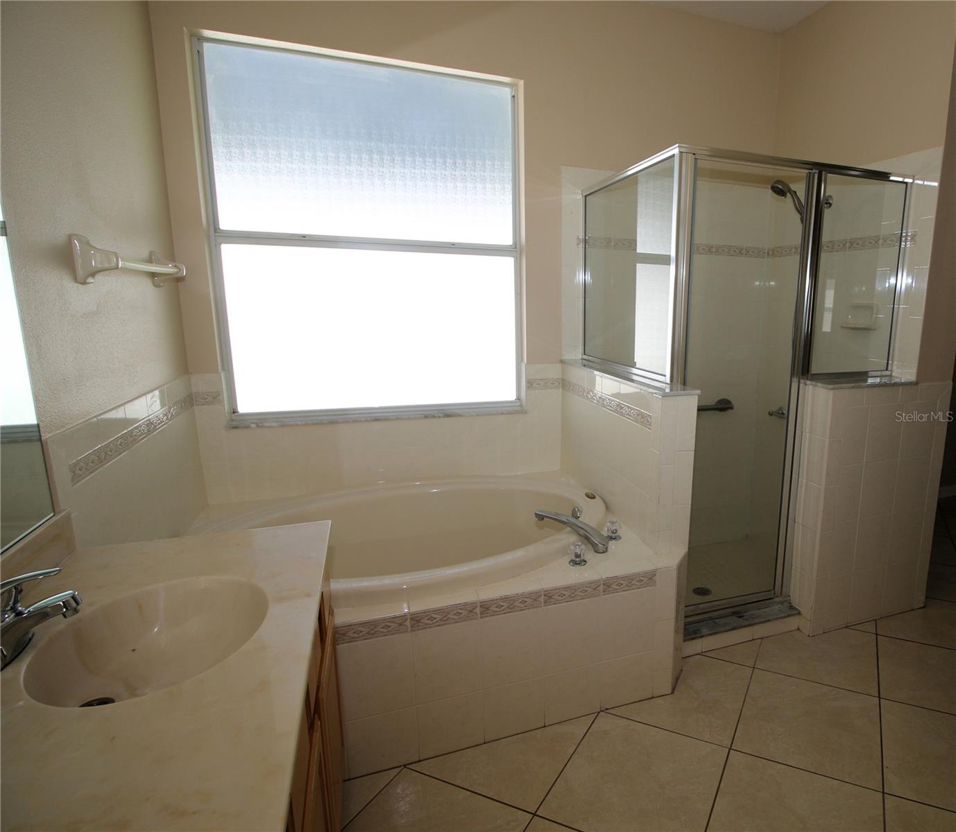 Garden tub and separate shower in Primary Bathroom