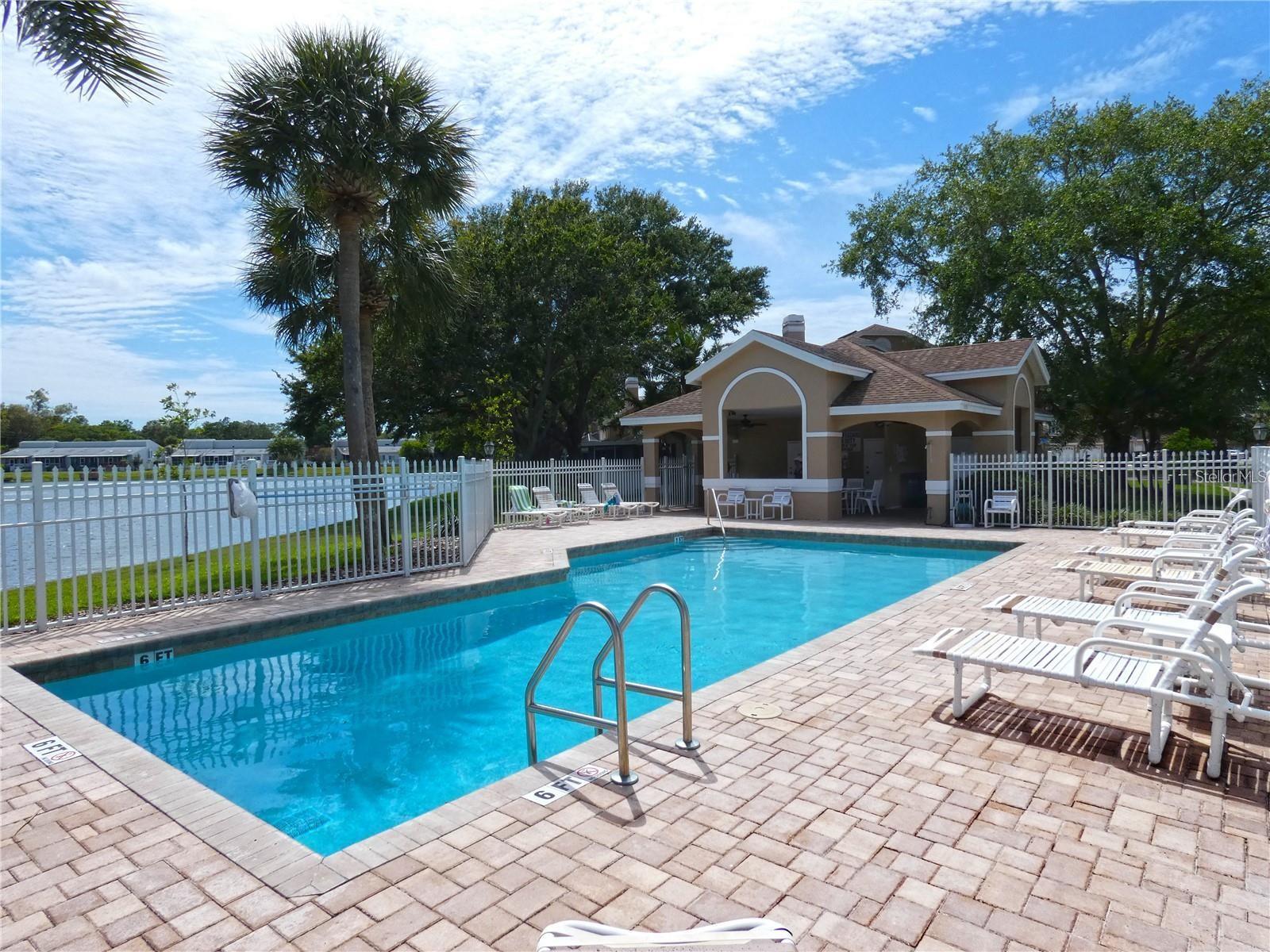 Covered area with bathrooms for pool area