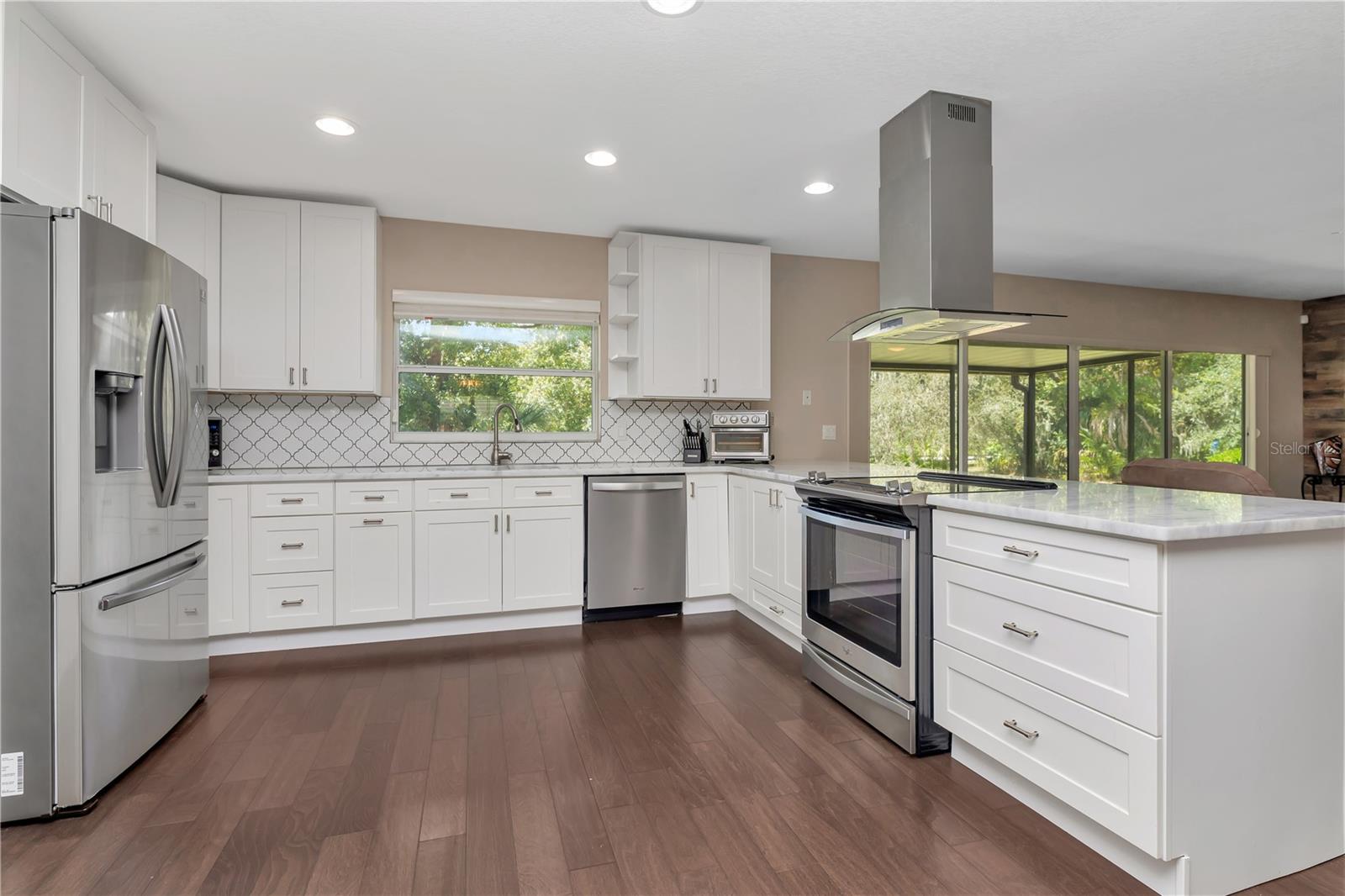 Kitchen with White Cabinets & Stainless Steel Appliances