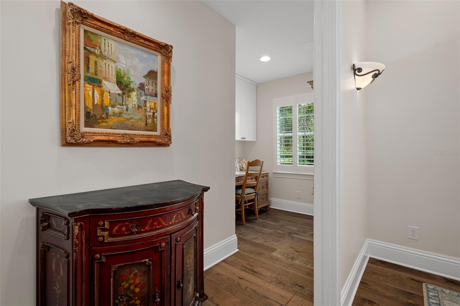 Versatile flex space off the dining room. The owner currently uses this space as their office but it could be a great wine pantry!