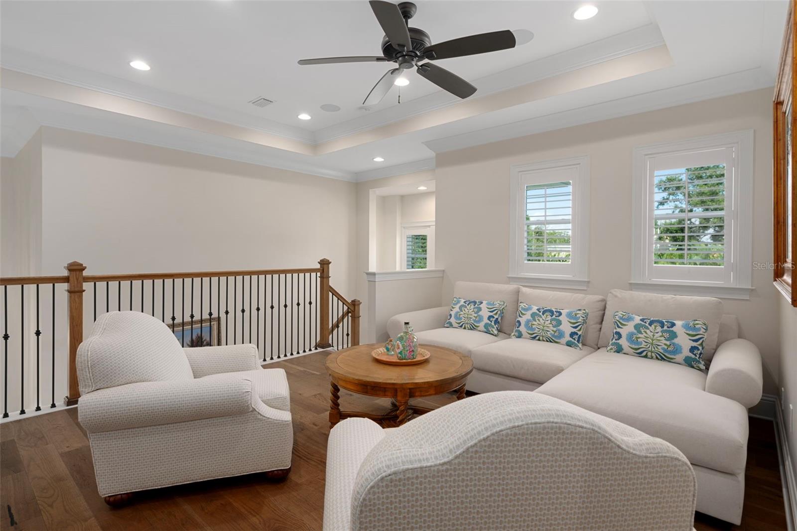 Loft seating area with recessed lighting