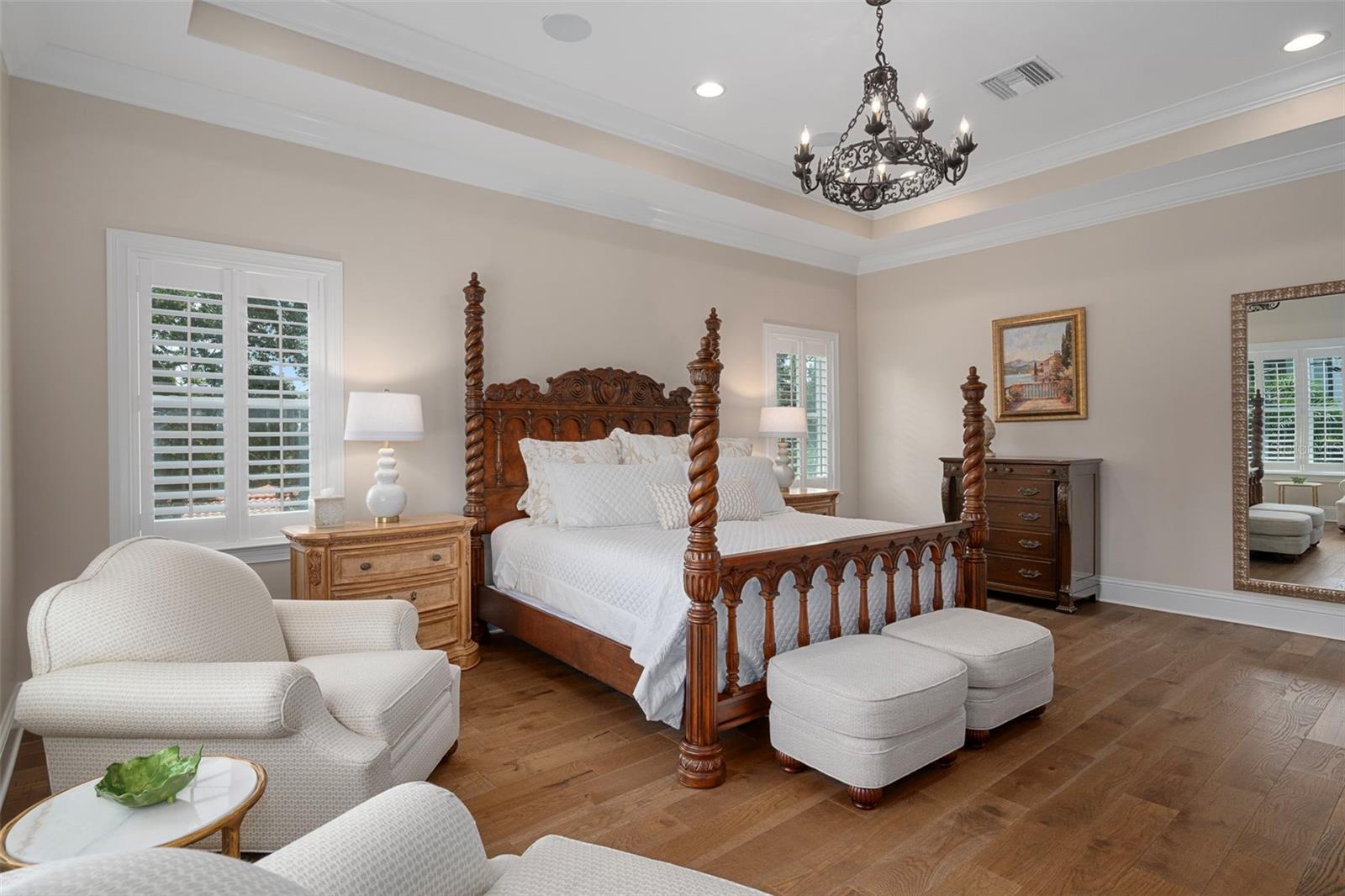Large primary bedroom with dedicated sitting area