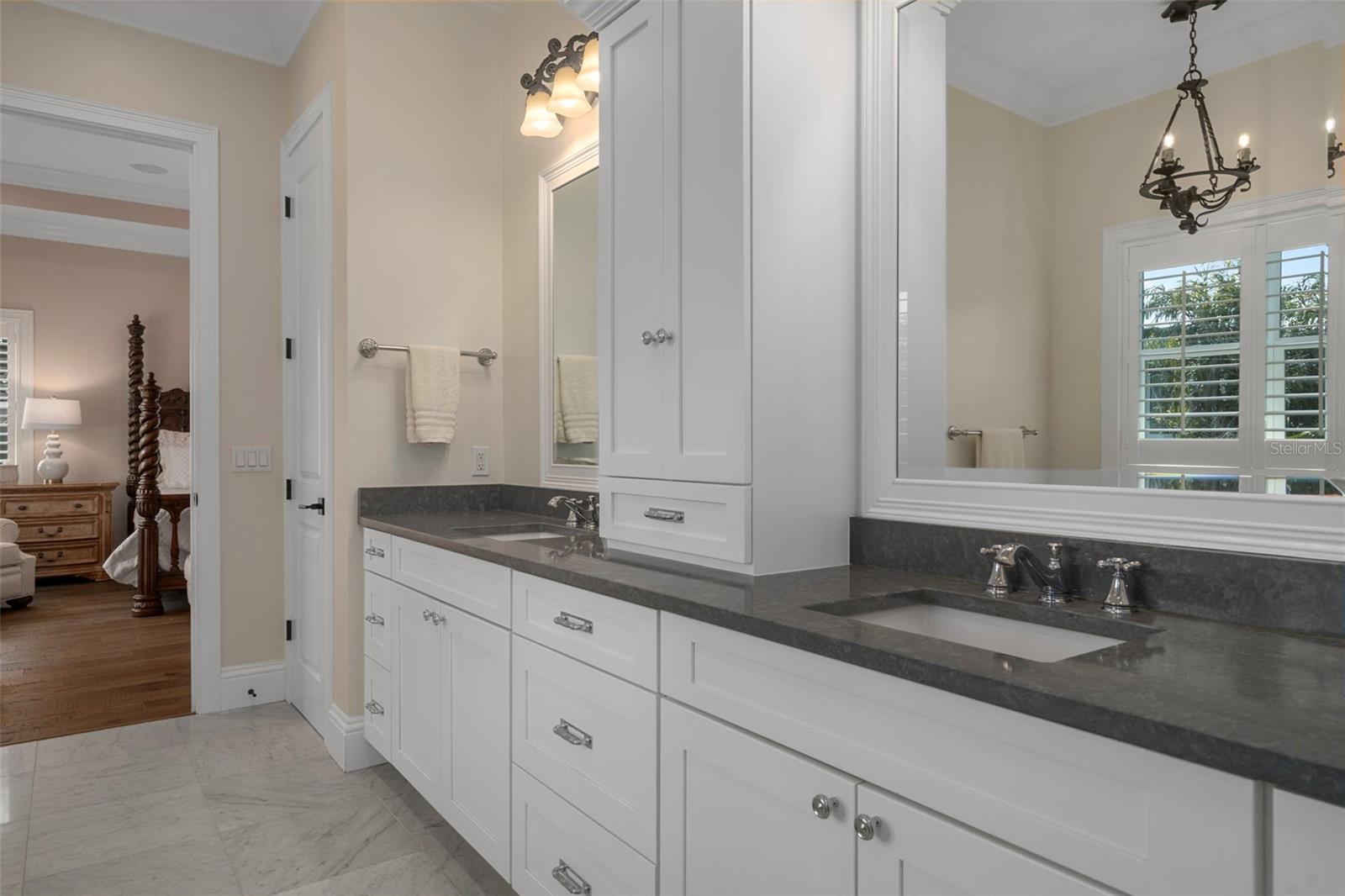Primary bath with dual sinks & custom cabinetry