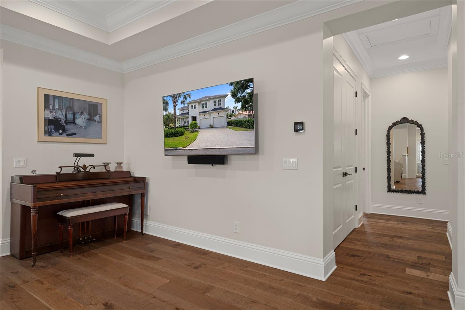 Upstairs hallway with access to additional bedrooms to the right and straight ahead to the left is the laundry room.