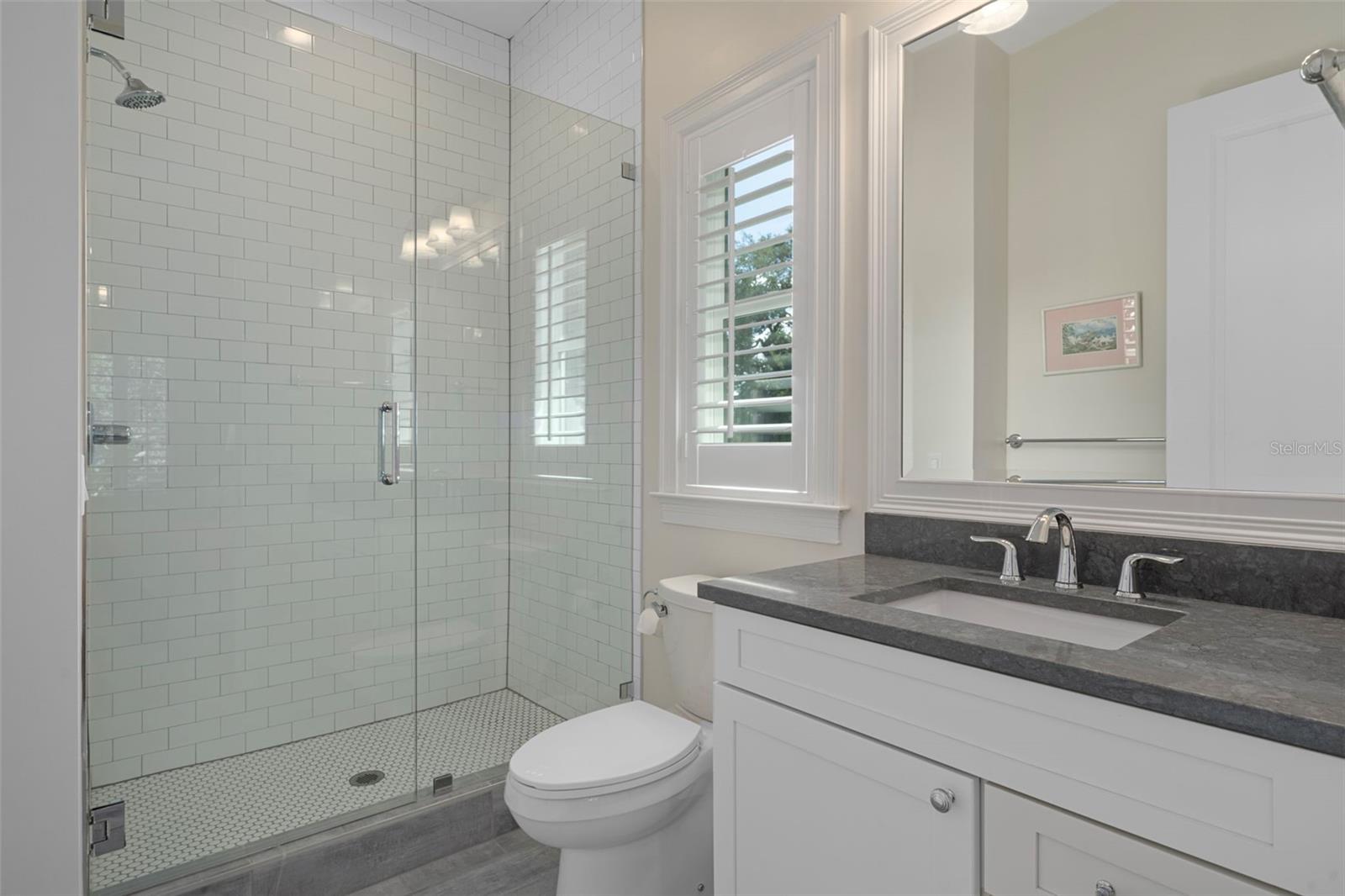 Ensuite bath #3 with glass shower enclosure