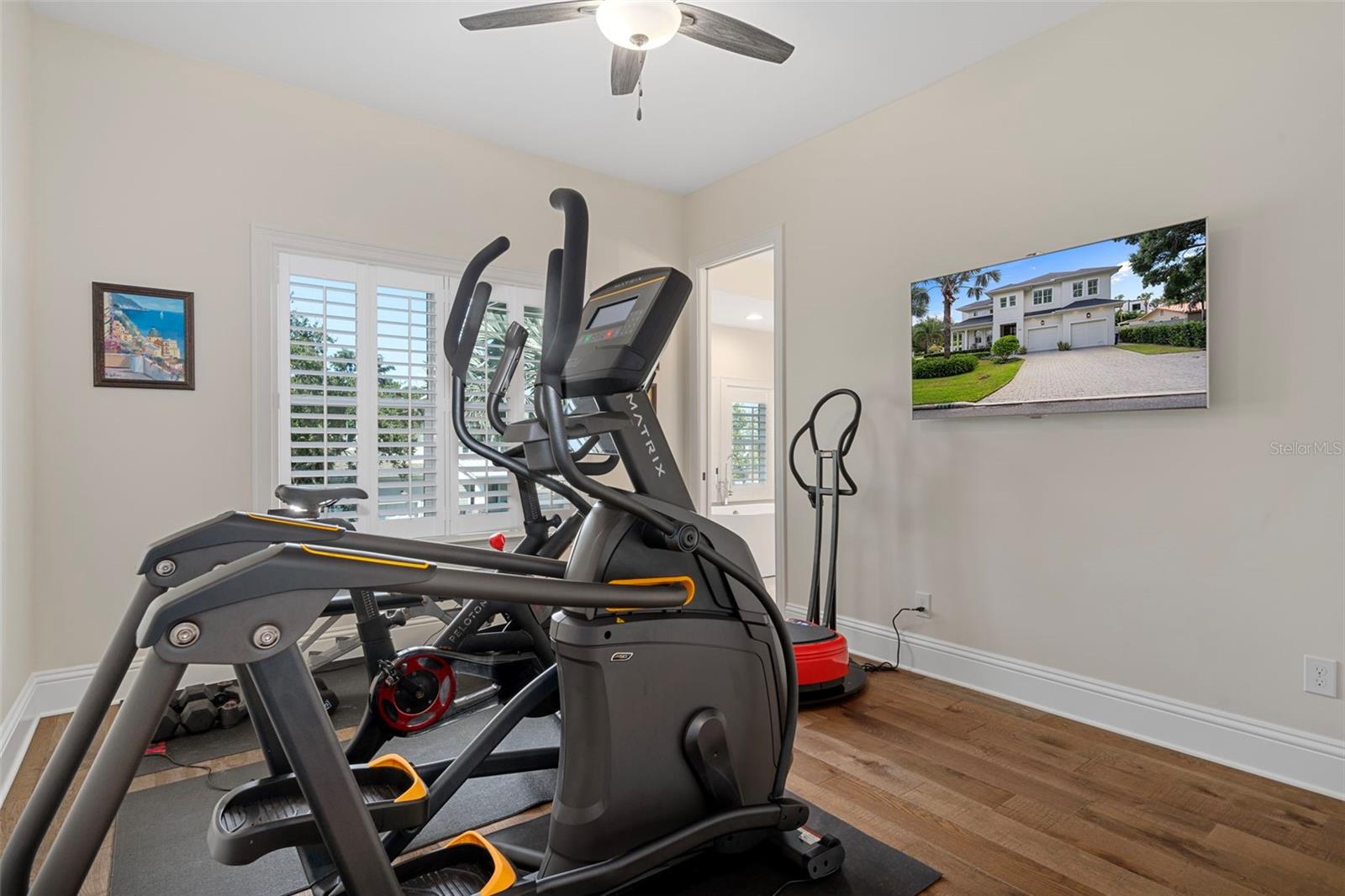Bedroom #4 is currently being used as a gym