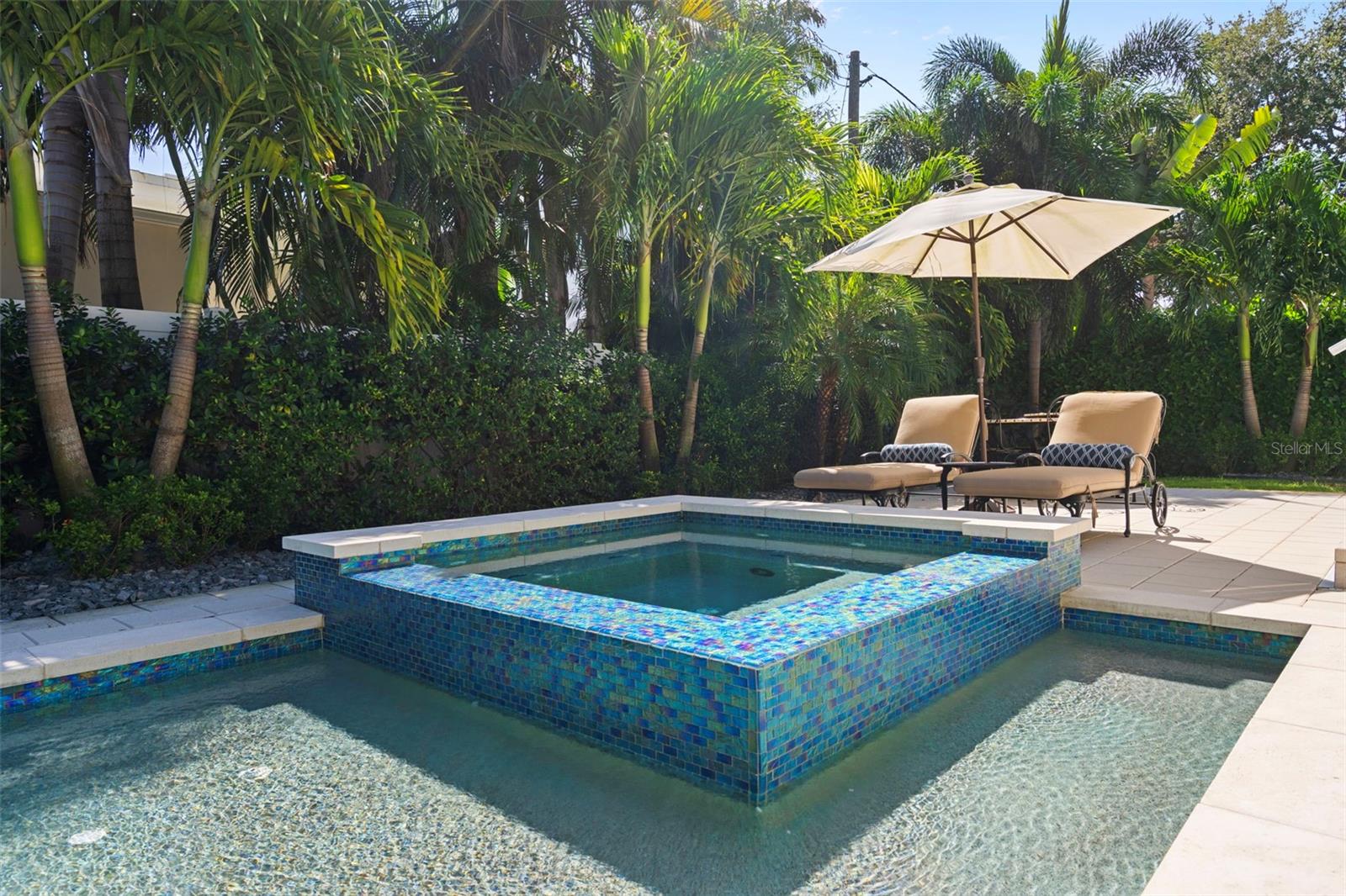 Spa with mosaic tile accents