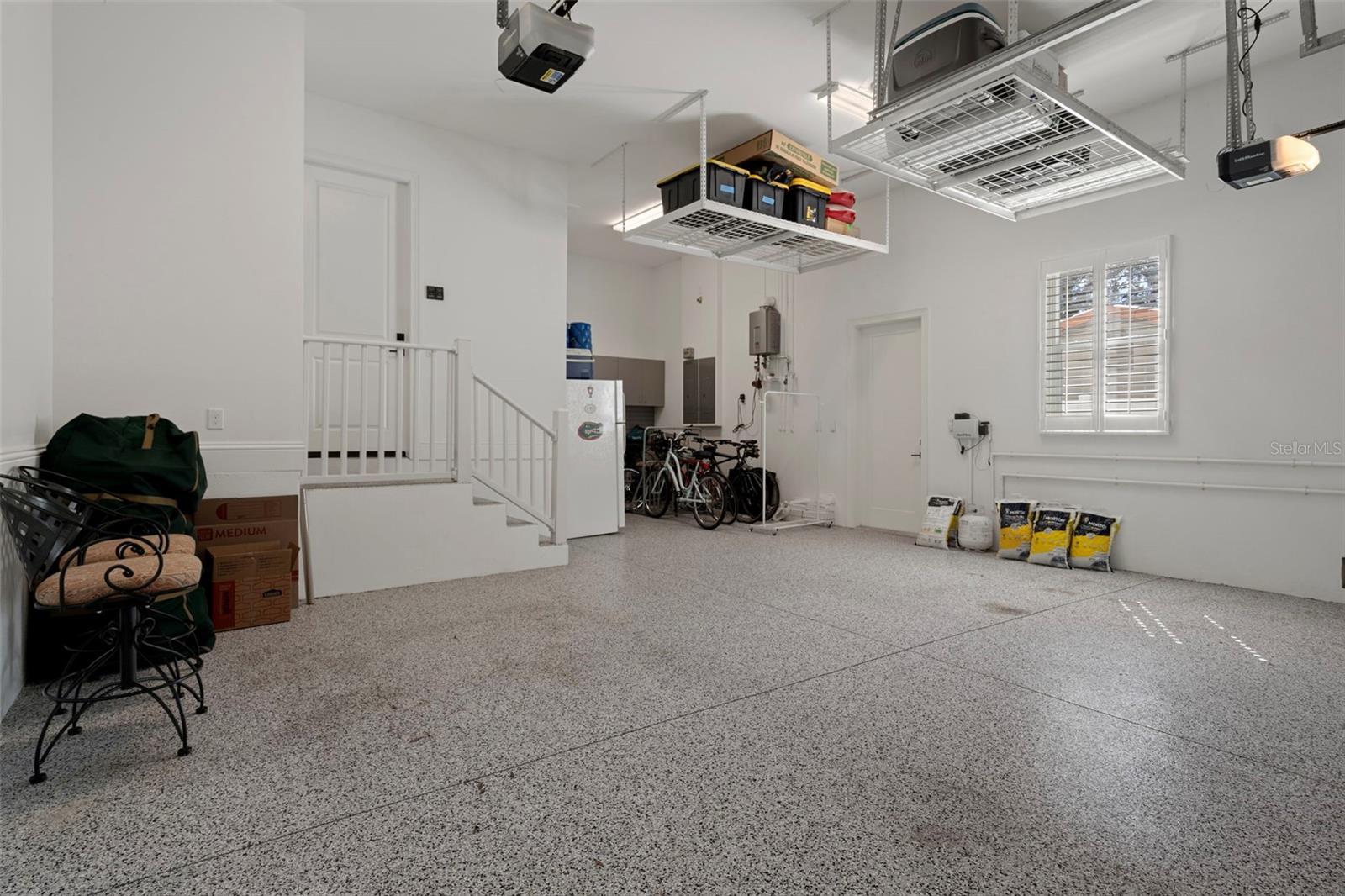 Three-car garage with custom flooring