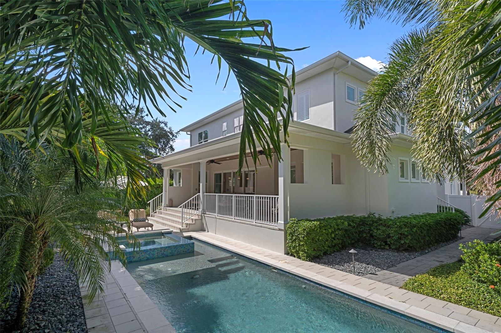 Oasis backyard with pool and spa