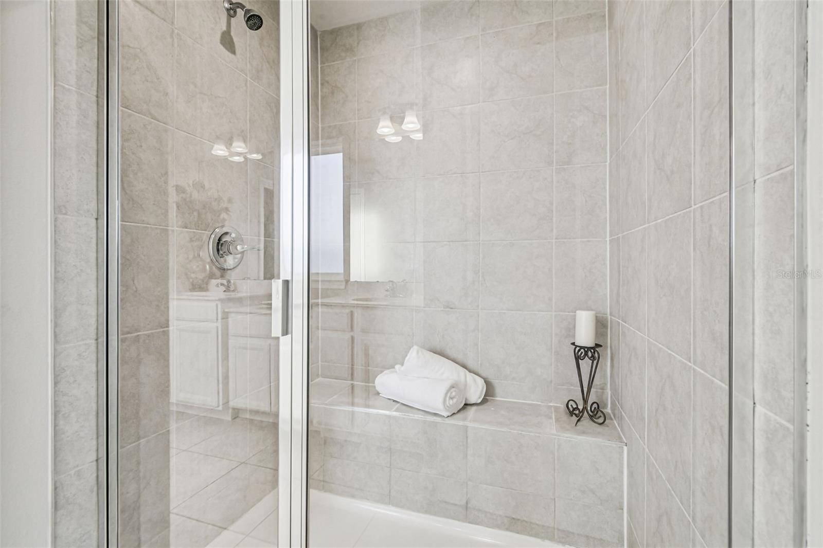 Walk in shower with built in bench