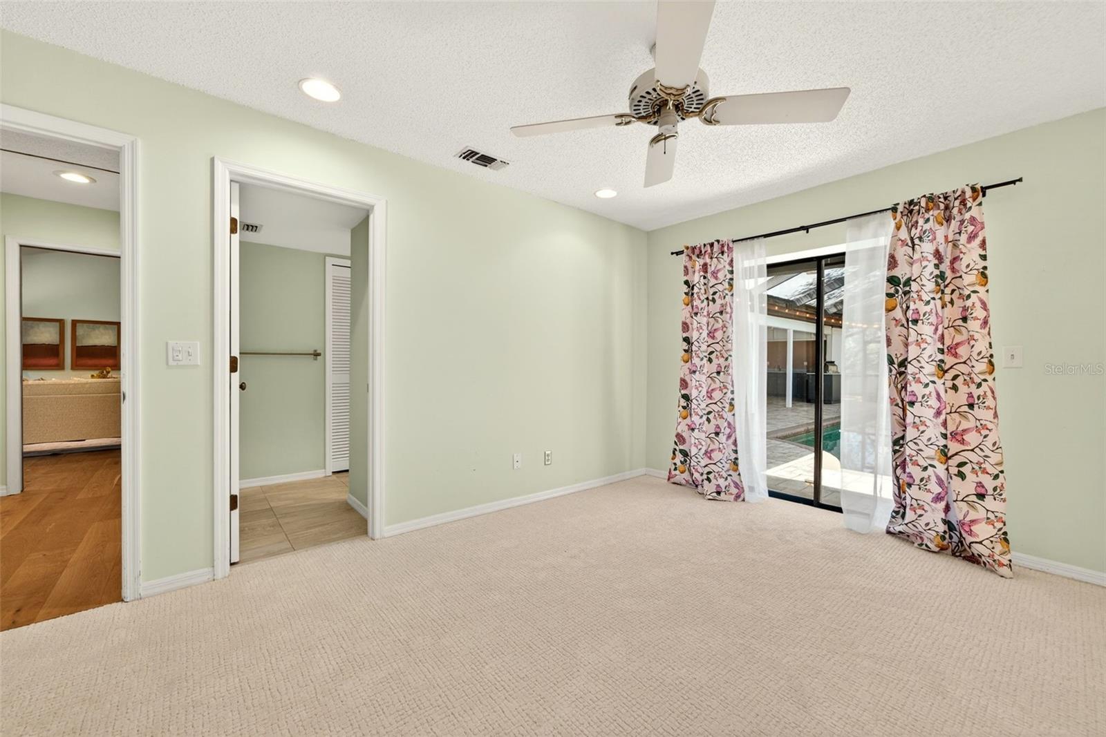 Third Bedroom with En-Suite Bathroom and Access to Pool