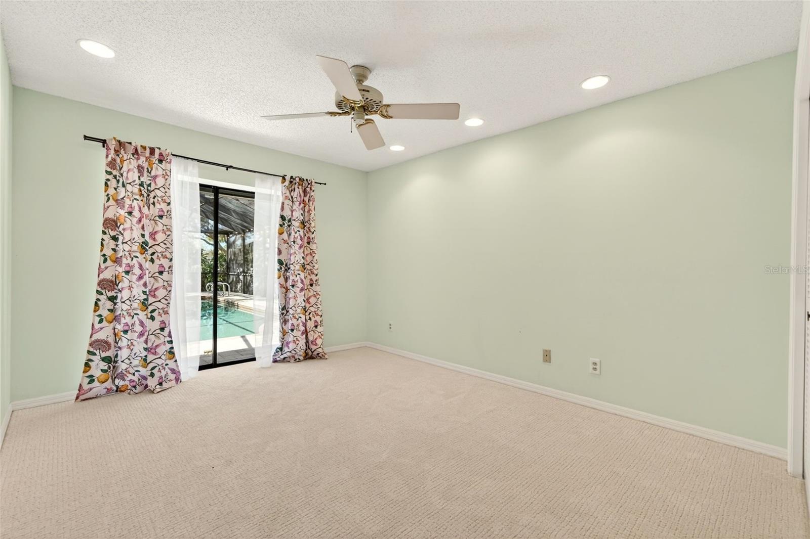 Third Bedroom with En-Suite Bathroom and Access to Pool