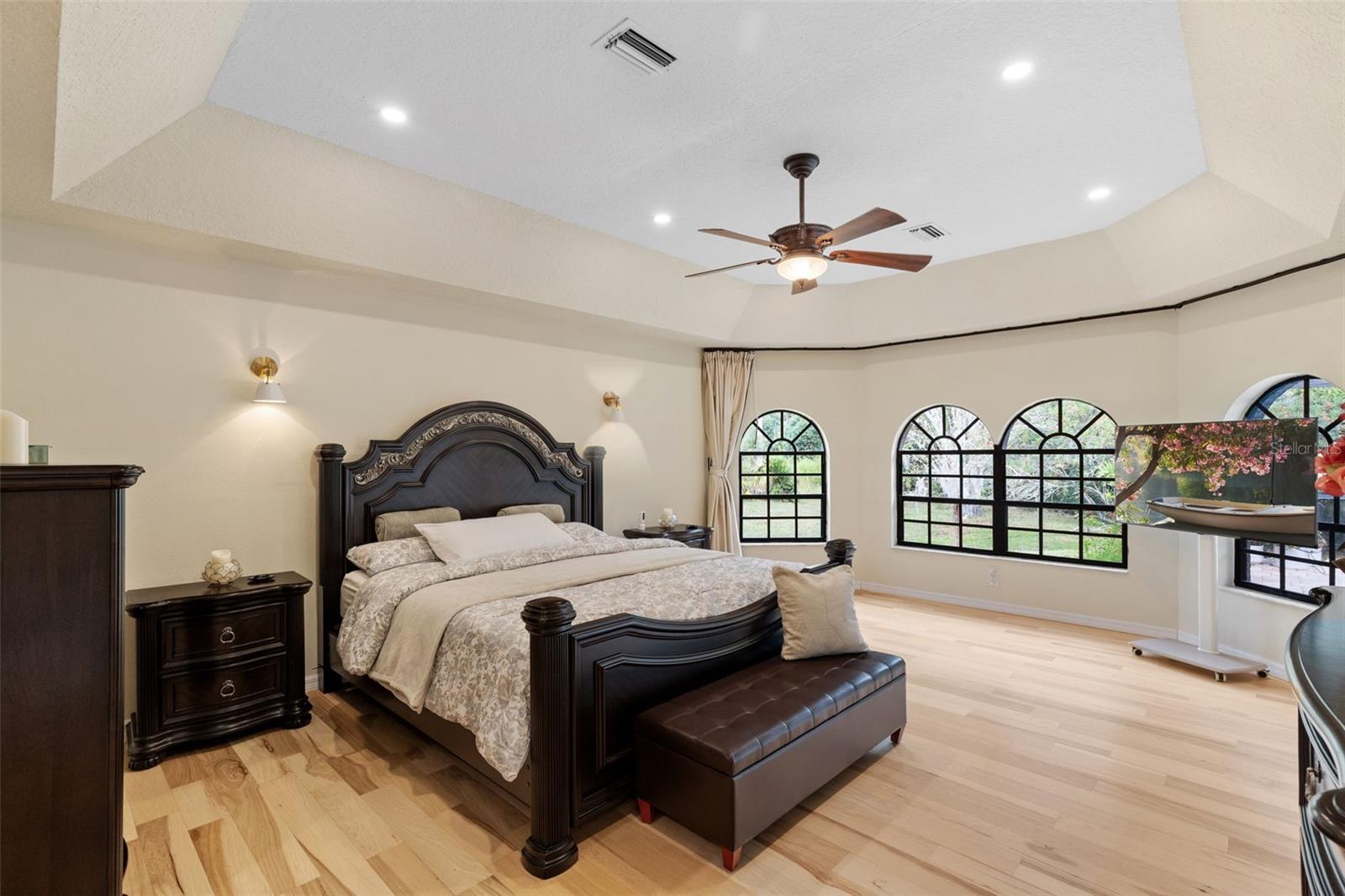 Quiet Primary Suite is located in the rear corner of property.