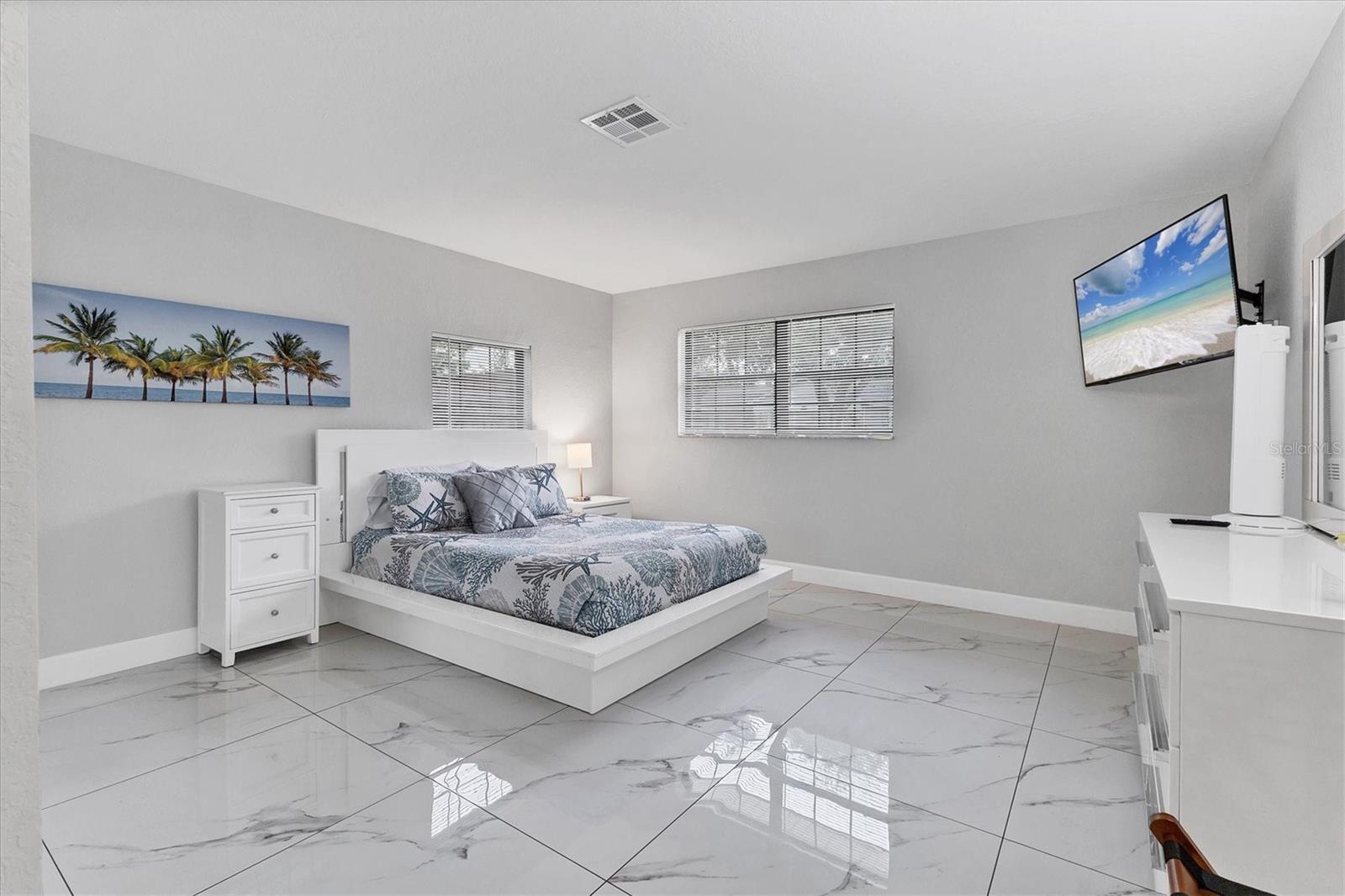 Located on the right side of the house, Bedroom 1 is the largest of the four and offers a built in TV and spacious built in closet.