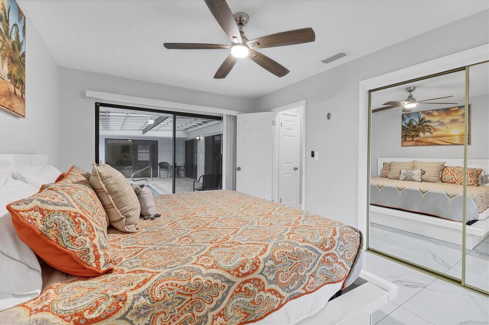 Bedroom 3 is located on the left side of the house and features a king size bed.