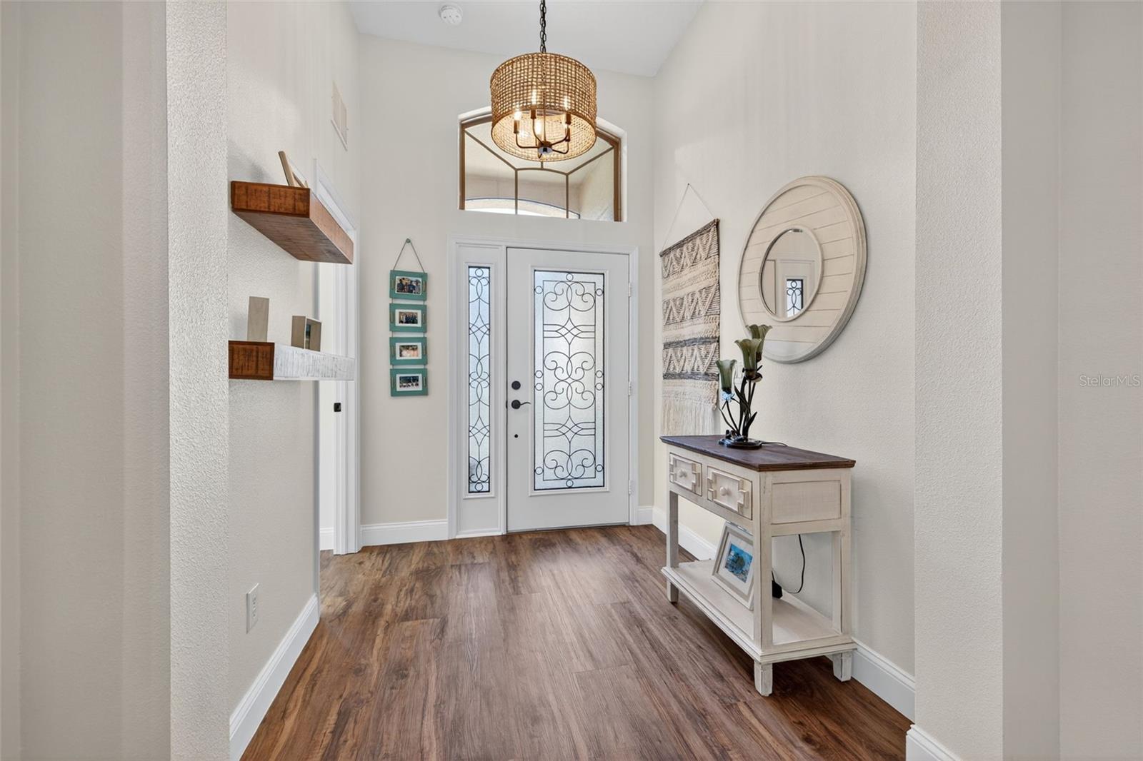 Foyer with soaring ceiling