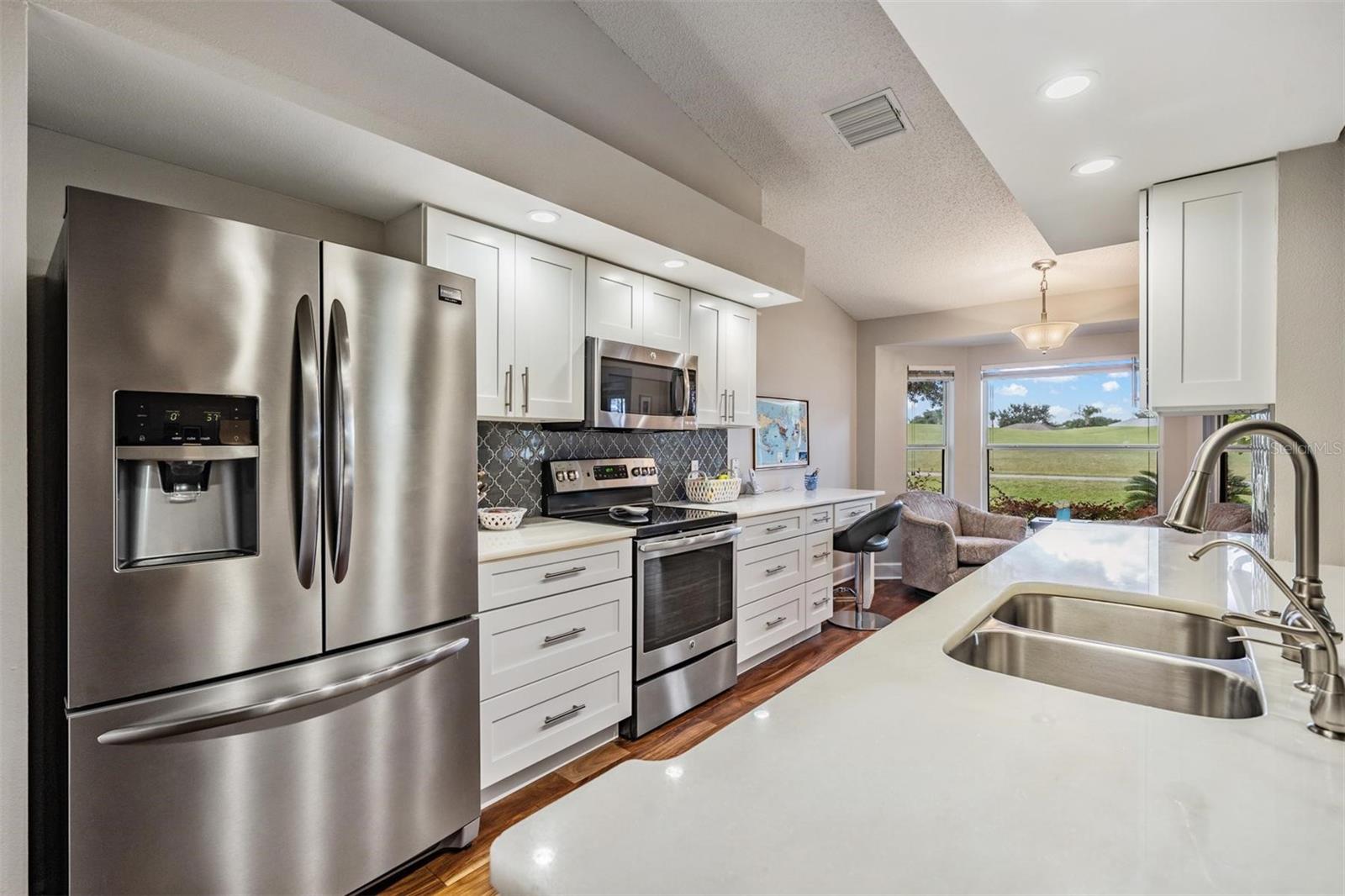 Remodeled kitchen with Italian marble countertops