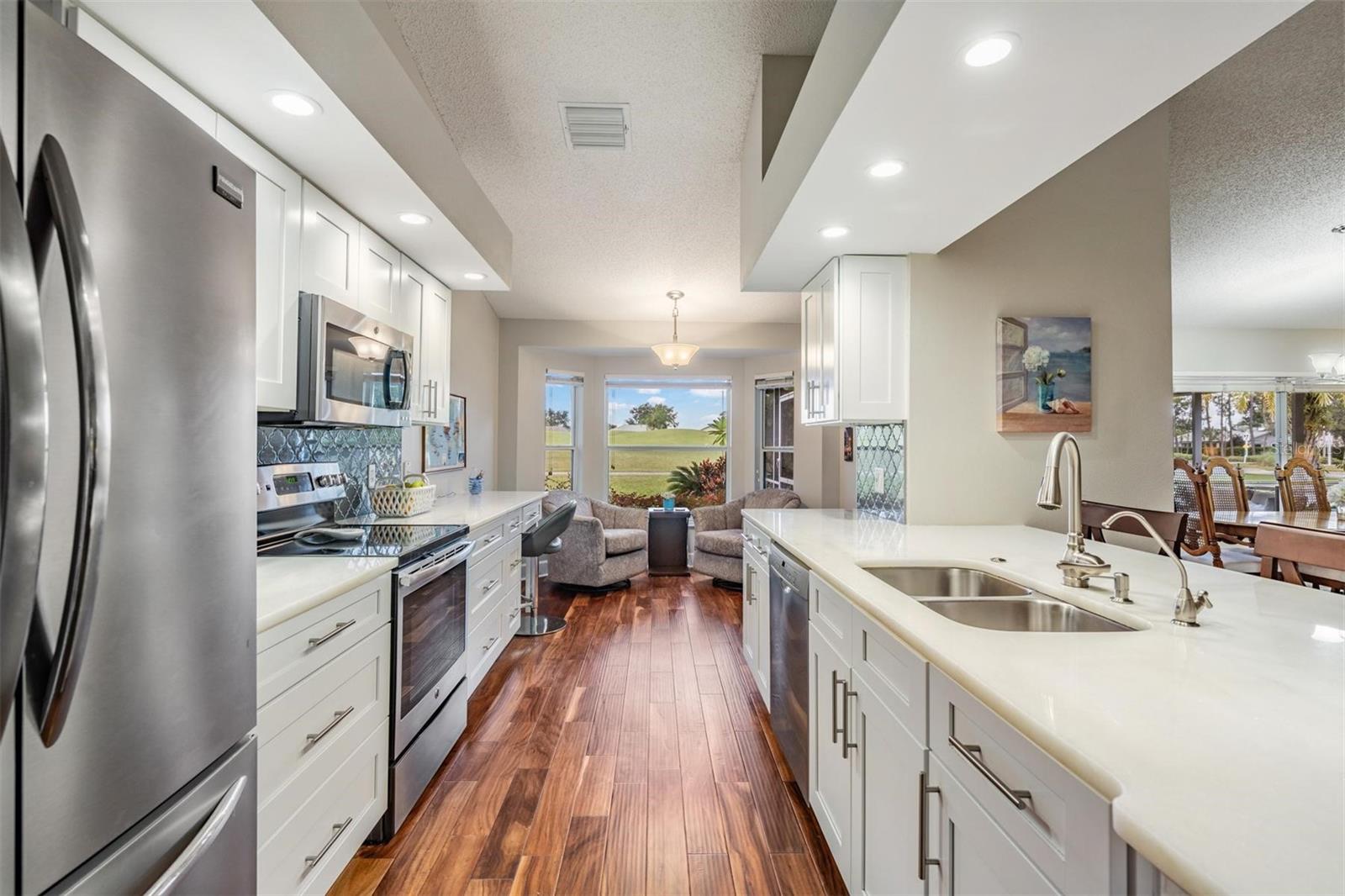 More than ample counter and cabinet space with sought-after pull-out drawers
