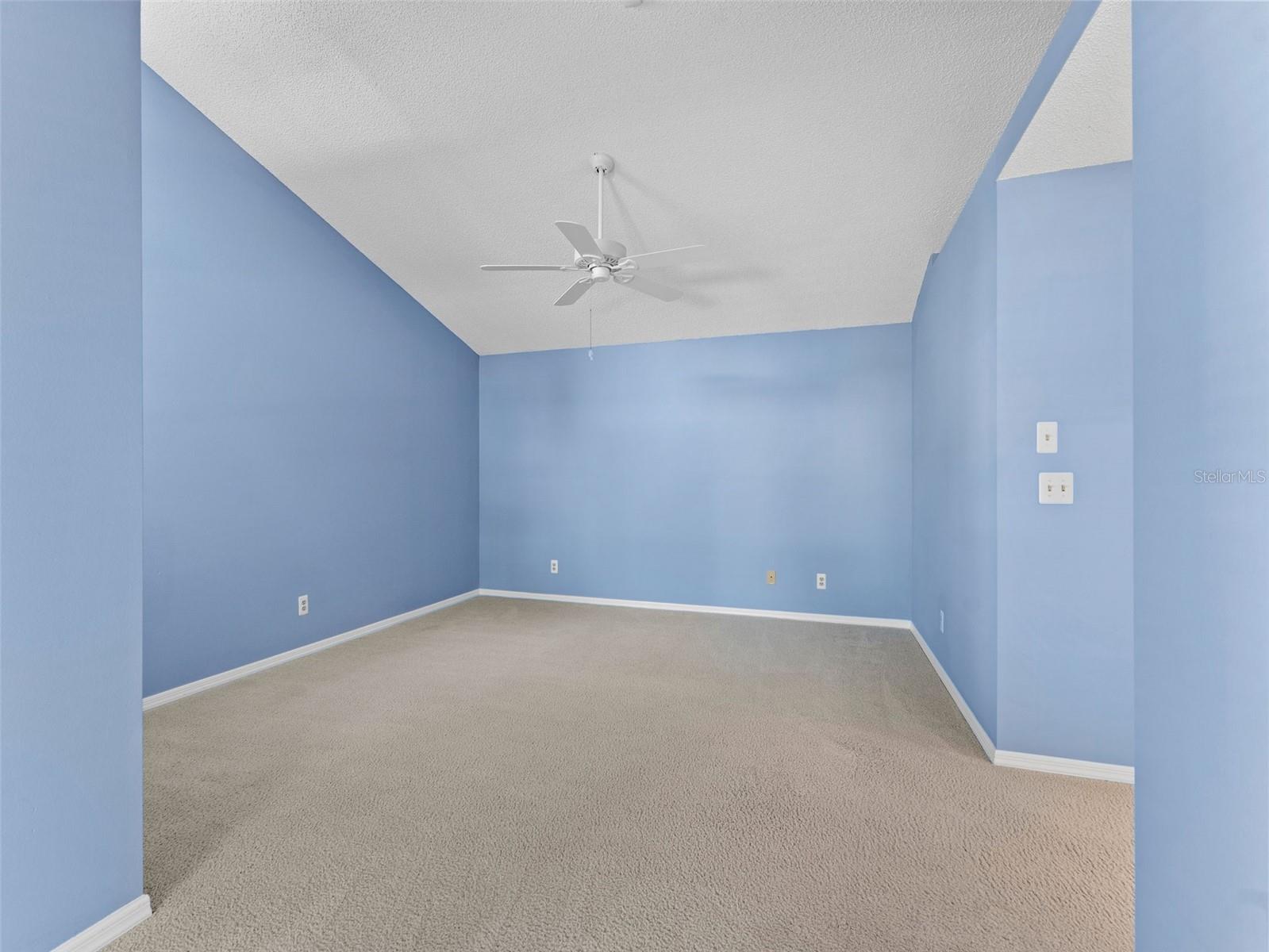 Bright and spacious primary bedroom — your private retreat to relax and unwind
