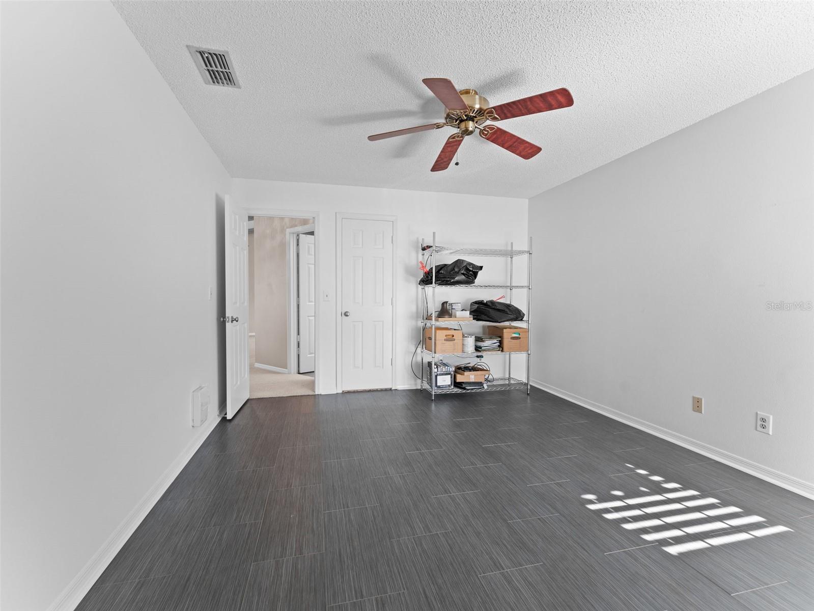 Spacious second bedroom with plenty of room for guests, an office, or a cozy retreat