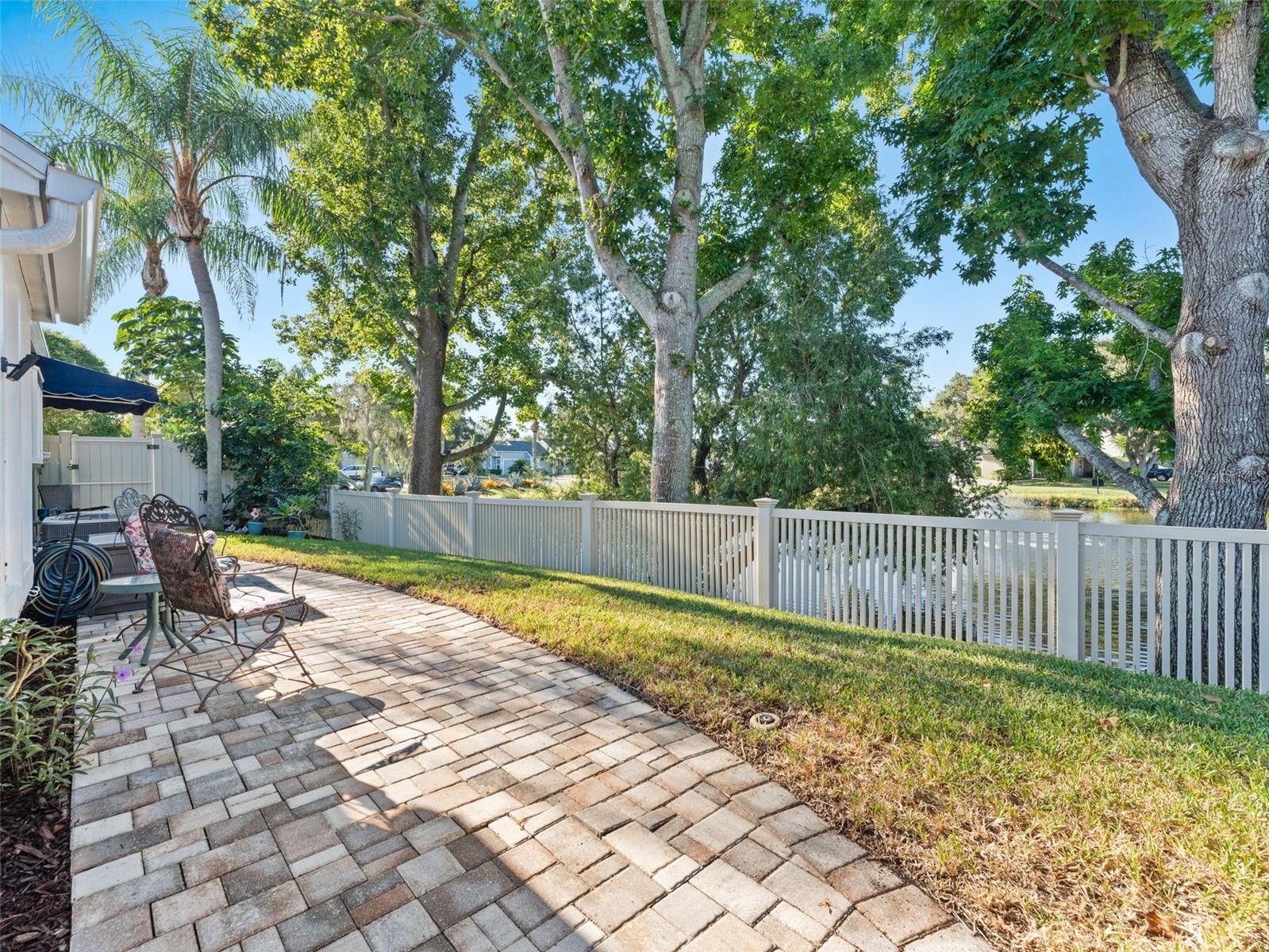 Charming paver walkway in the backyard — adding style, function, and easy access throughout your outdoor space