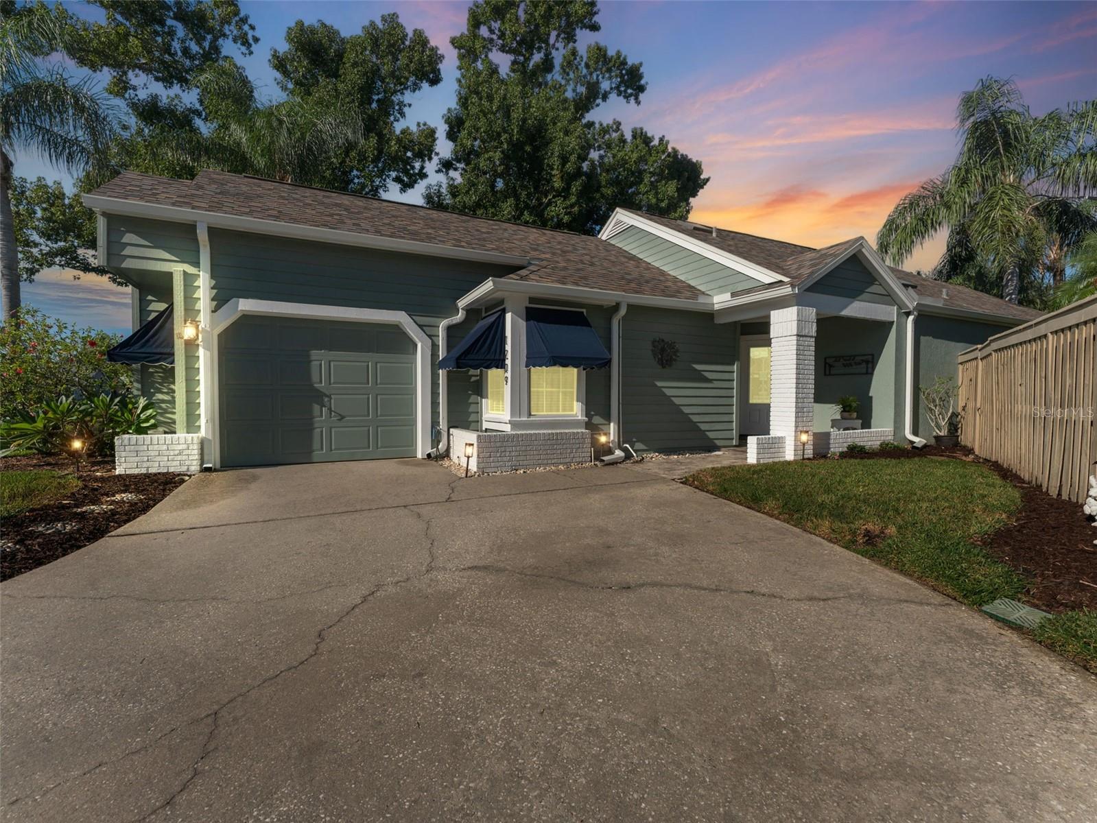 Twilight curb appeal. A beautifully maintained home that shines day or night