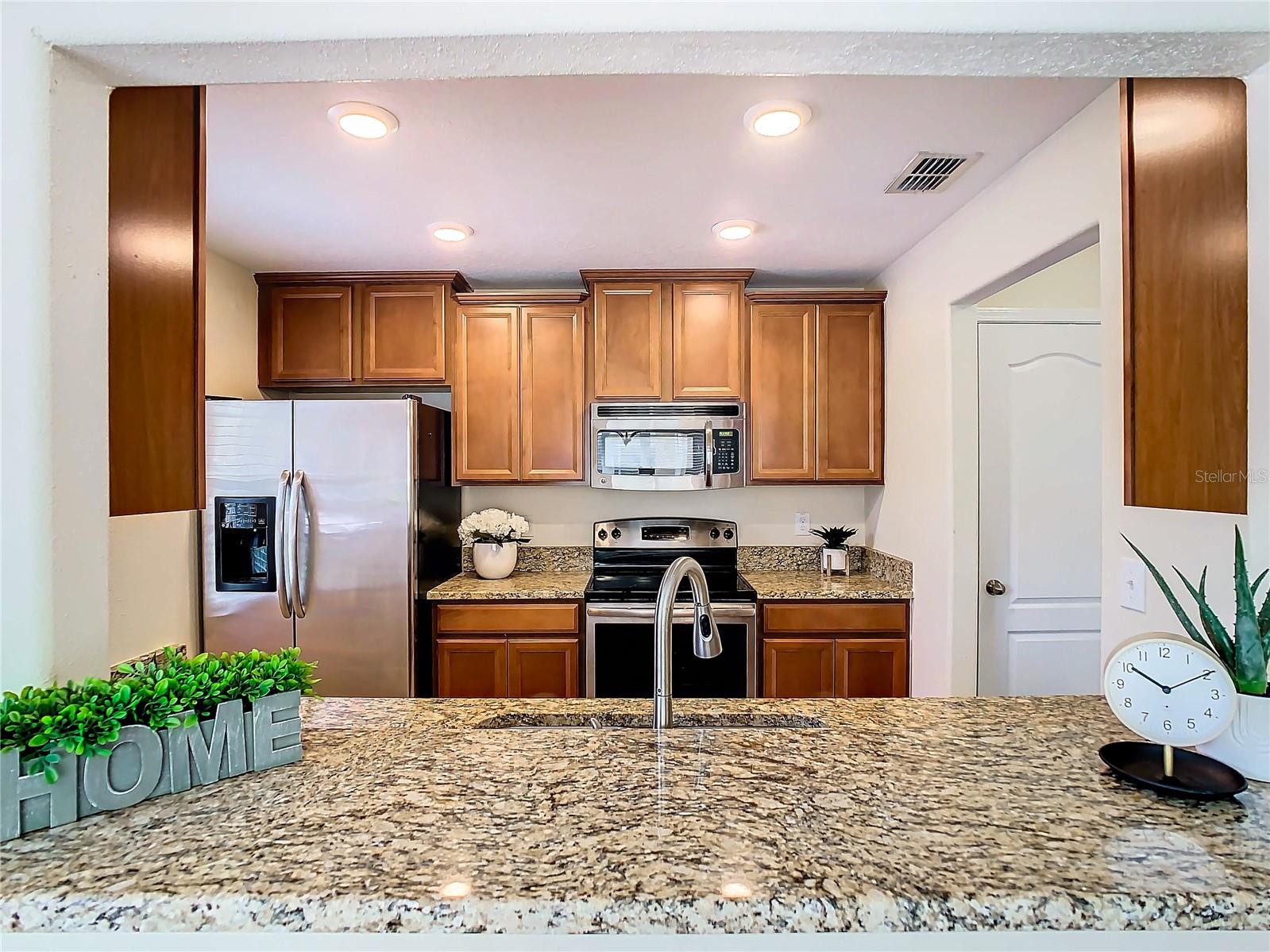 Pass through Kitchen to Dining