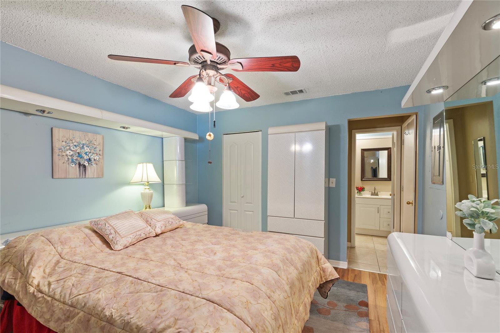 Primary bedroom with private bath and walk in closet