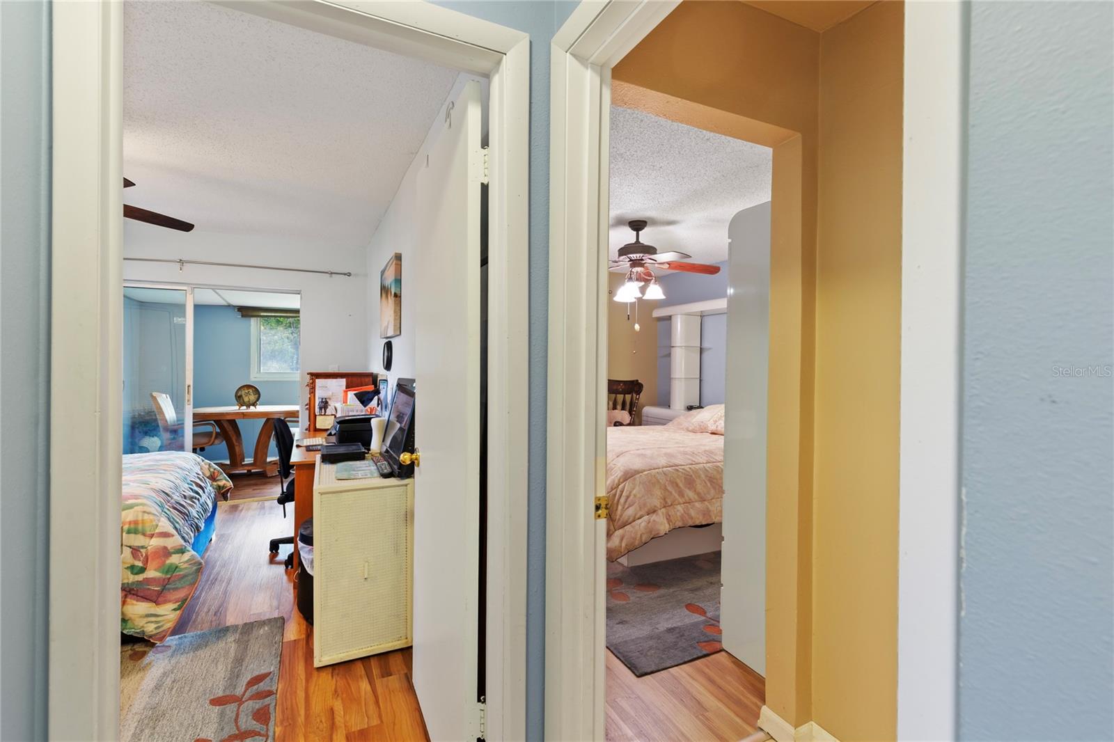 View of both secondary and primary bedroom