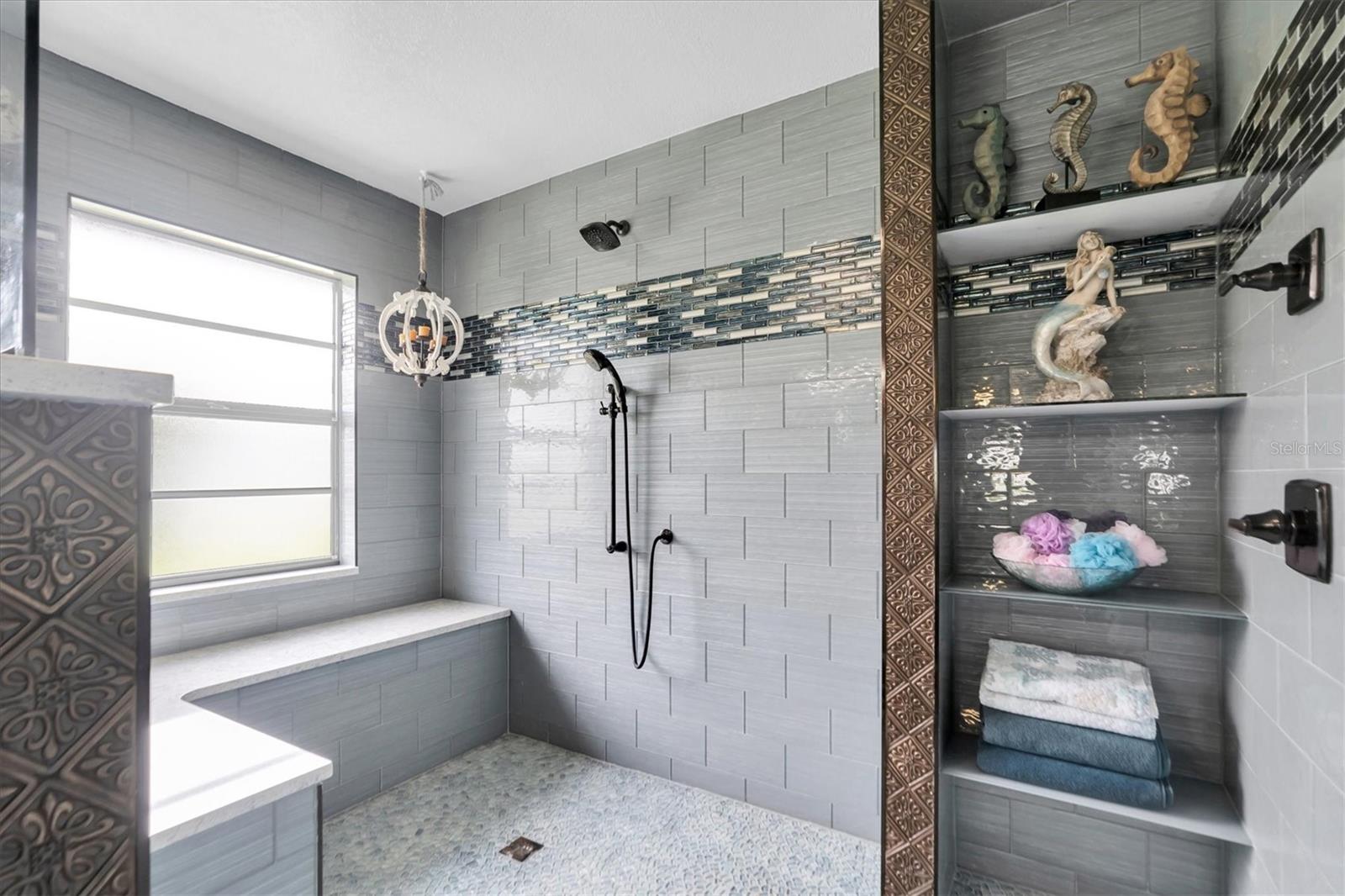 Oversized shower with built-in seating