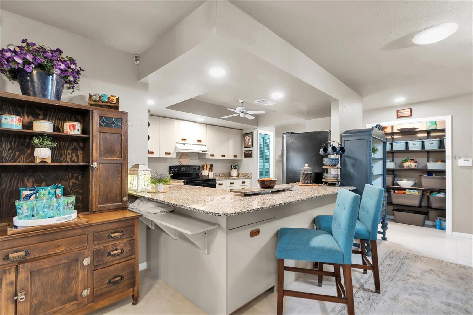 Breakfast bar and pass-through to the family room