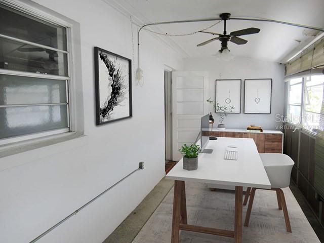 Virtually staged enclosed porch - bonus room