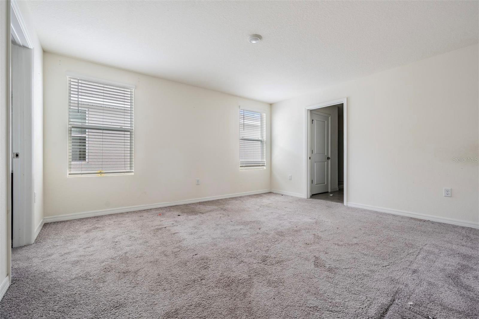 upper level, primary bedroom suite