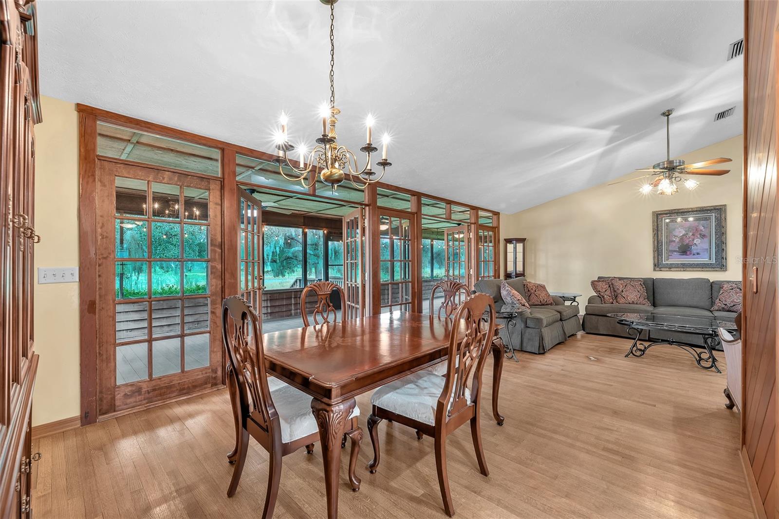 Two sets of French doors opens from the Dining and Family room onto the expansive back porch