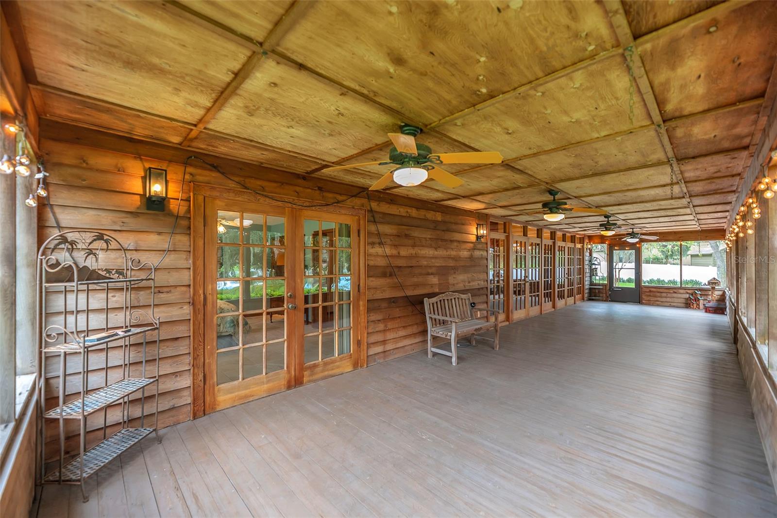 The house exterior and porch are made of durable and rot resistant cedar wood.