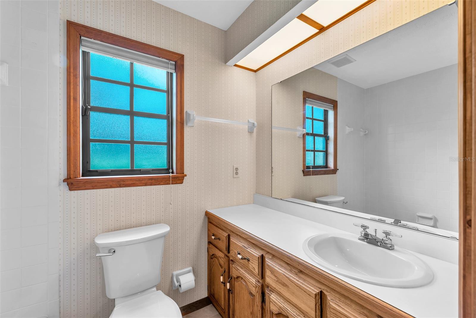 Bathroom #2 with tub/shower combination is shared by Bedroom #2 and #3.