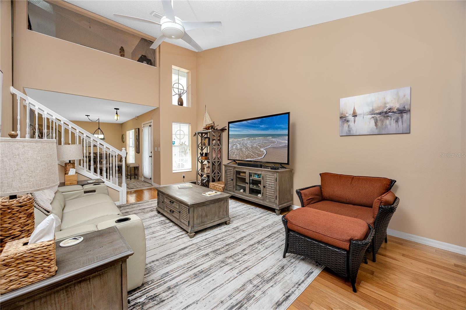 Living room with bonus loft in background