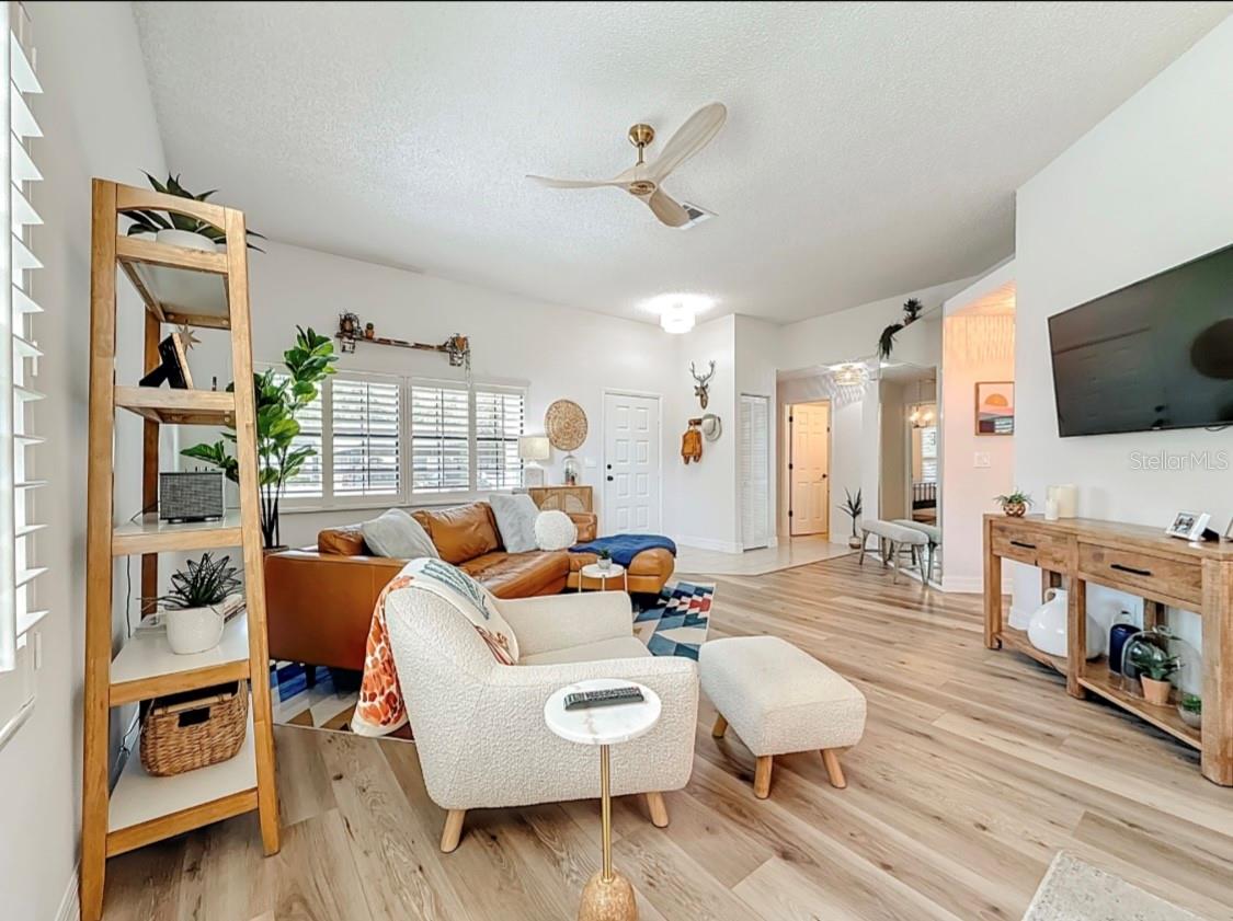 MIRROR IN LIVING ROOM MAKES SPACE APPREAR LARGER