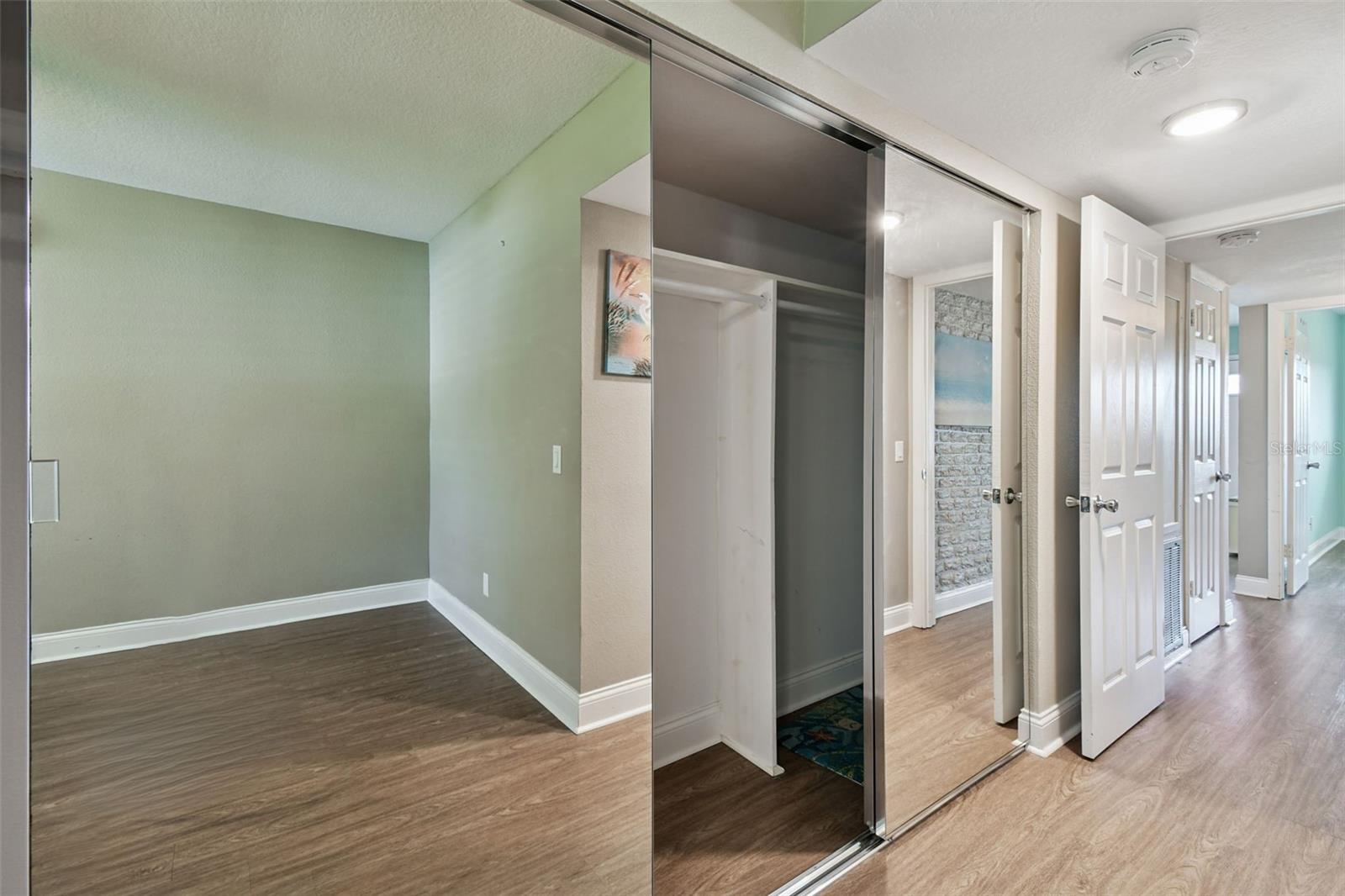 Primary Bedroom with Mirrored Closoet doors
